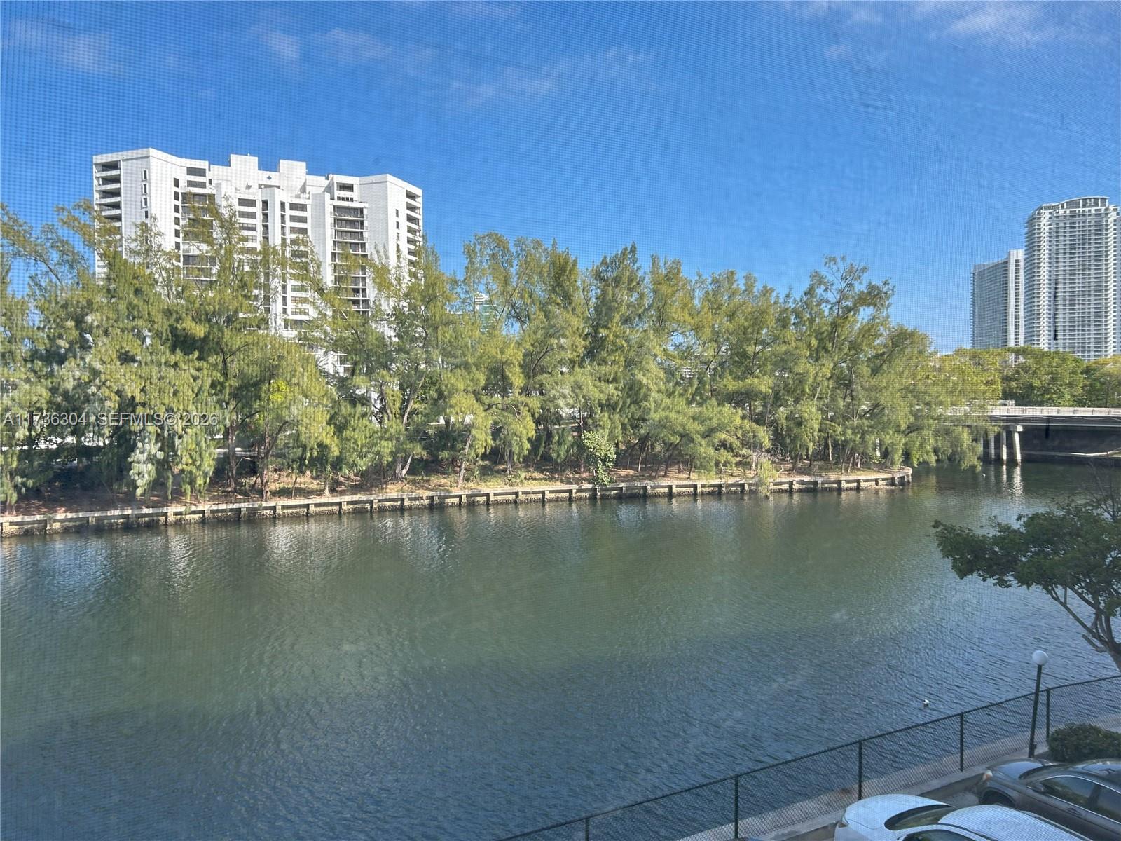 Just reduced, seller is motivated. Come see this waterfront spacious 2 bedroom, 2 bathroom, split floor plan located in the heart of Hallandale Beach. This bright unit offers new faux wood floors and tile flooring in the bathrooms and kitchen. Enjoy your mornings on the large screened balcony overlooking serene water views. The community offers two heated pools, Sauna, gym and more. This condo is located in a highly sought-after area, offering the perfect balance of convenience and lifestyle.  Close to the beach, restaurants, shopping centers, minutes to I95 and Ft Lauderdale international airport.  
Rentals are not permitted.