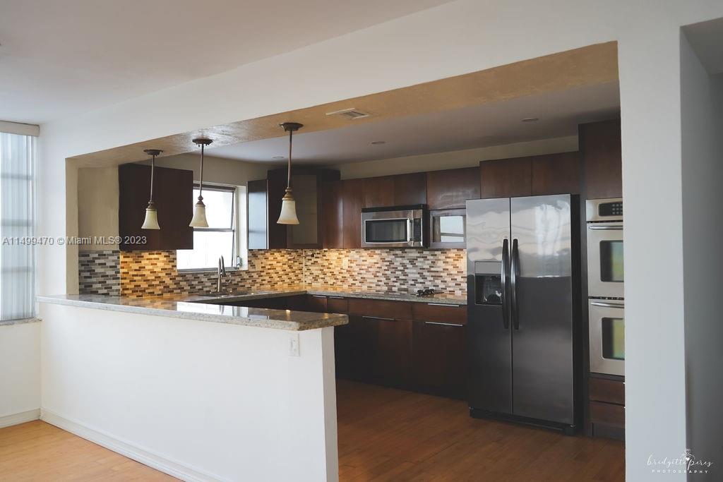 COMMODORE PLAZA CONDO - Residential