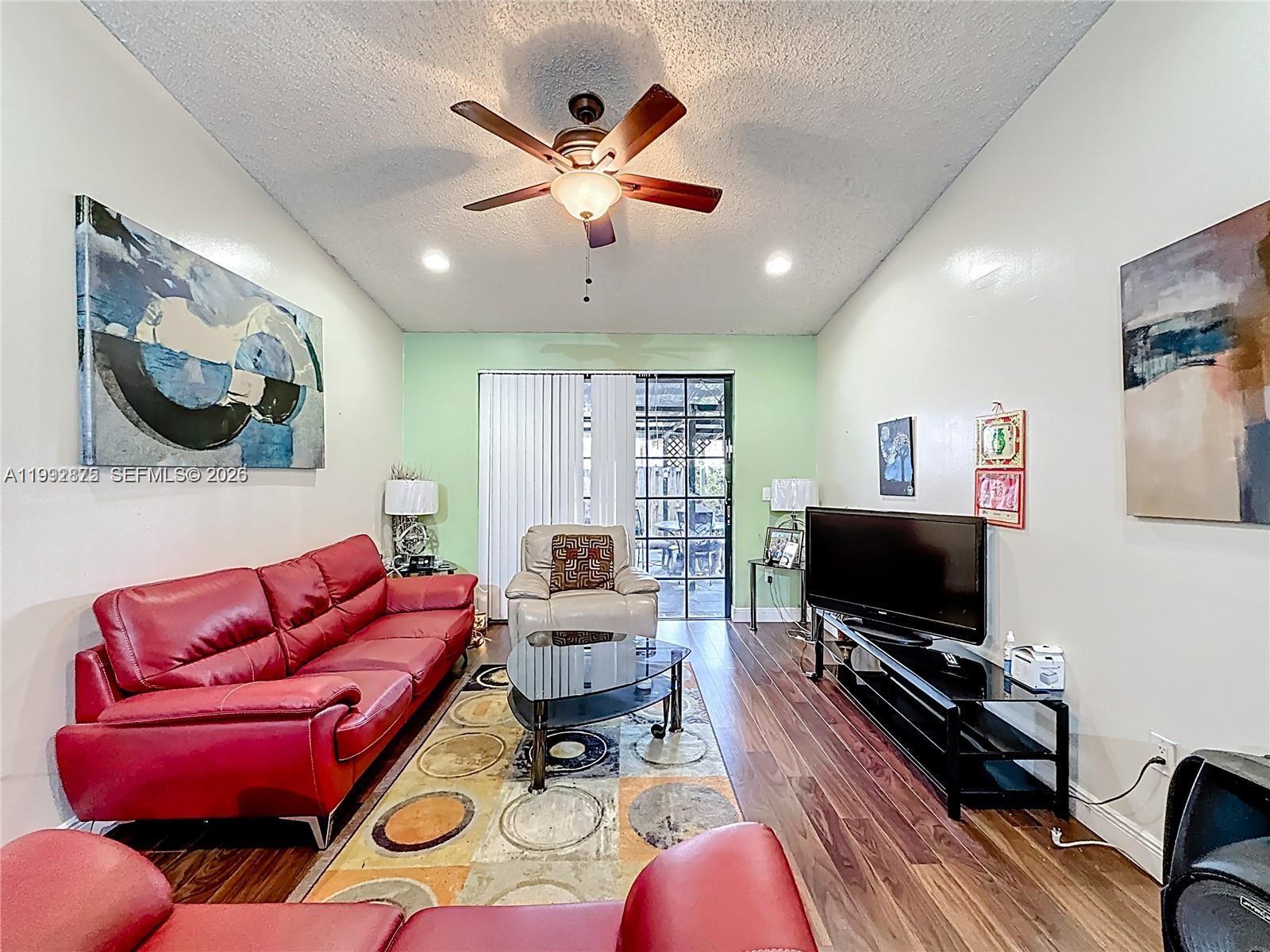 Welcome to this beautiful, well-maintained, and spacious 2-bedroom, 2-bathroom townhome located in the desirable community of Aspen. This lovely home features elegant wood flooring throughout and a private fenced patio—perfect for entertaining, BBQs, or simply relaxing outdoors.
Enjoy the convenience of two assigned parking spaces located right in front of the home, along with ample guest parking for visitors. Aspen offers a variety of amenities, including tennis courts, a sparkling community pool, a playground with a jungle gym for children, and 24-hour security patrol.
Ideally situated just minutes from Miami Lakes shopping, fine dining, parks, and major highways, this home provides both comfort and convenience. Best of all, the community features a low HOA fee.
Don’t miss this fantastic opportunity to make Aspen your new home!