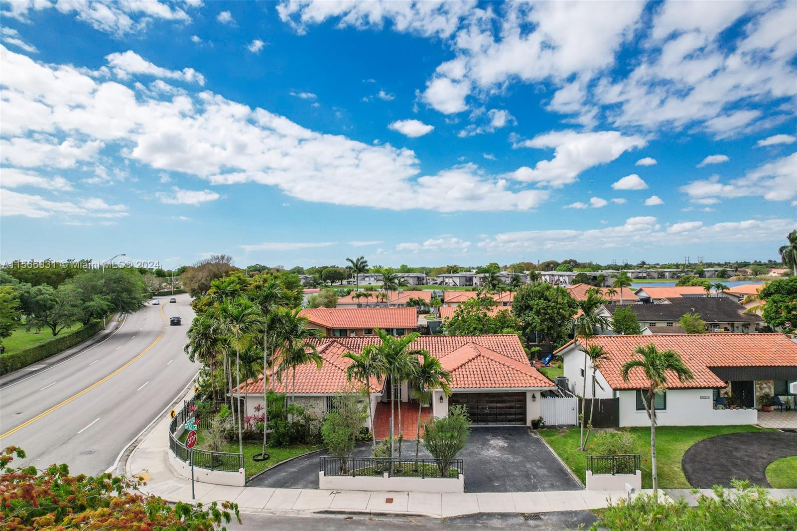 Centrally located, this 4-bedroom, 3-bathroom offers convenience and comfort. Nestled near shopping plazas and schools, it ensures easy access to essentials. The 2-car garage adds practicality. Embrace its potential to customize and create your dream home. Nestled in a peaceful neighborhood, this home features a blank canvas for those looking to modernize and personalize. Eat-In-kitchen with ample cabinet space. An Extra Large Master suite, featuring an ensuite bathroom. Step outside to your private backyard oasis, complete with a patio, lush landscaping, and plenty of space for outdoor activities and a pool. Space to park your RV or Boat. No HOA, and near to Turnpike Extension.
