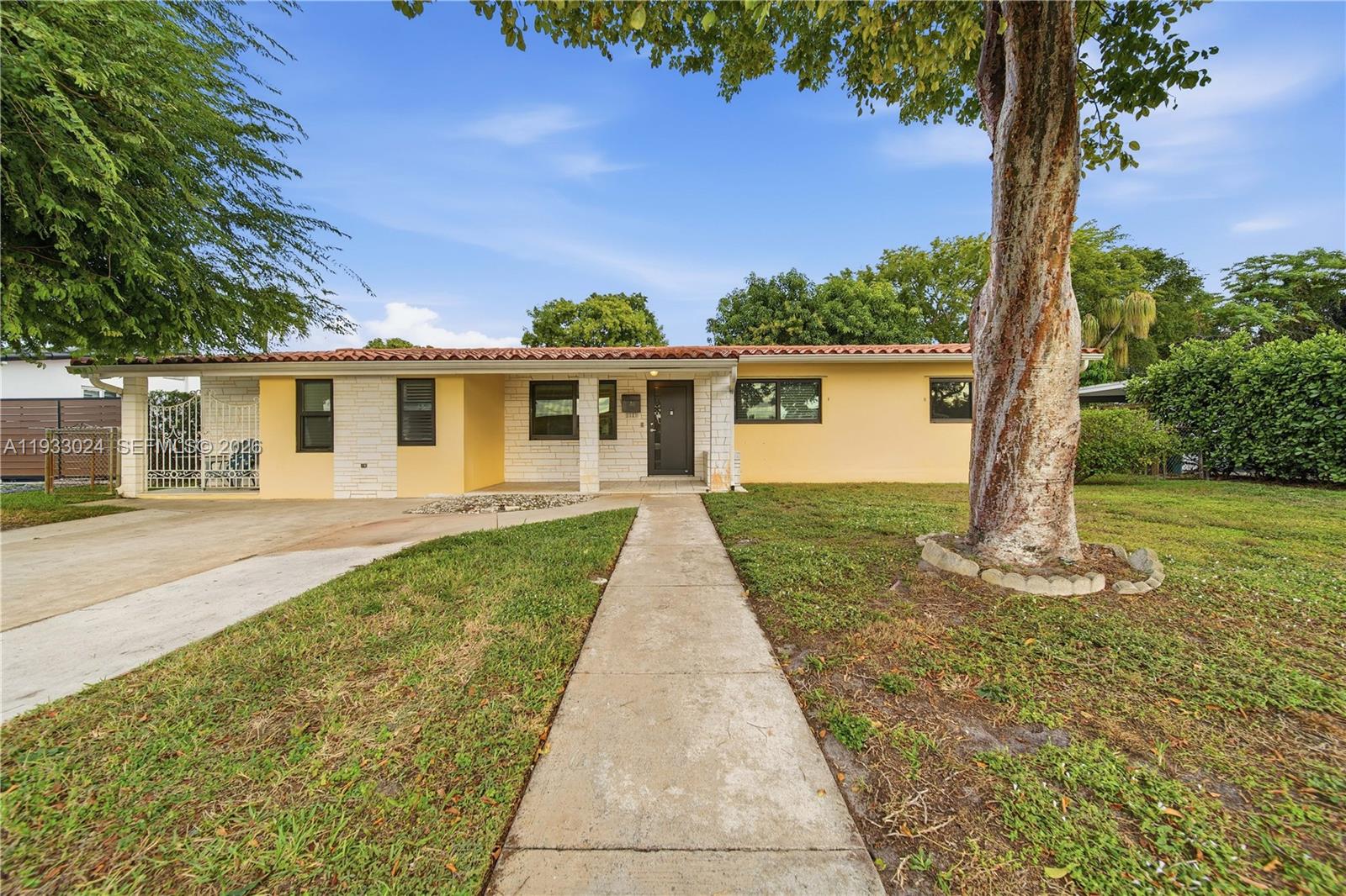Remodeled Westchester Single Family Home with 1,809 sq ft Living Area per last Appraisal, 2,300 sq ft Total Square footage including the covered back patio and front porch. Featuring 10" x 72" wood look porcelain tiles throughout, White Shaker Style Wooden kitchen cabinetry with Quartz countertops and Marble tiled backsplash. PVC Sewer/Drain Pipes, Generac generator, Covered patio, In-law Quarter / Studio with it's own private entrance, kitchenette, and washer/dryer. All impact windows & Doors, Formal living area, kitchen open to dining area and family room. The Laundry room offers lots of cabinets for storage and additional counter space from the kitchen. Showers in two bathrooms have Grohe shower systems. There is a 12 x 20 storage shed and a large mango tree in the yard. Located to many shopping centers, major highways, dining options, Florida International University and much more. Call today to schedule an appointment.