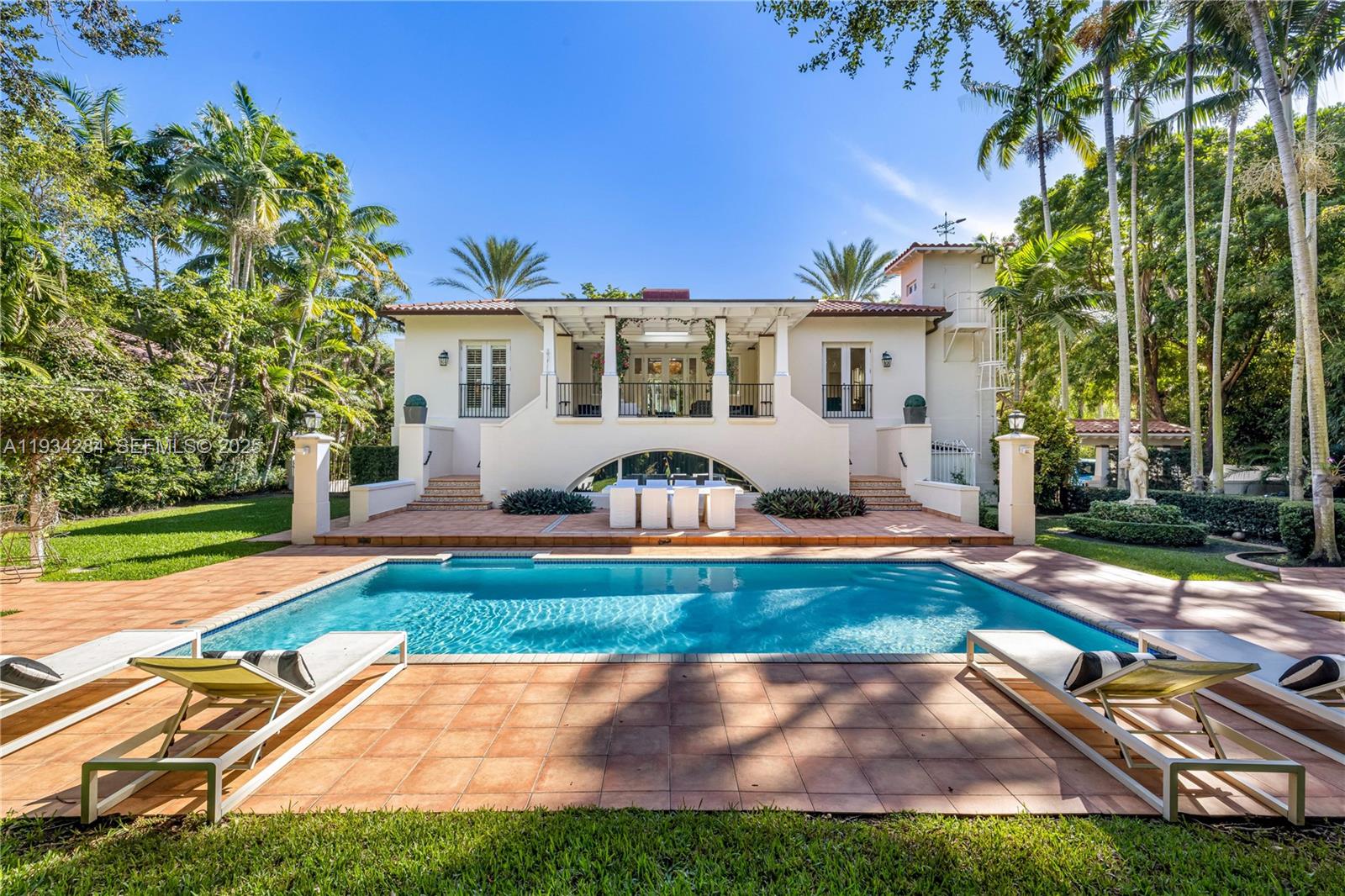 This exceptional Cocoplum residence offers 5 bedrooms and 5.5 bathrooms on an expansive 23,000-square-foot lot. Fully and thoughtfully updated, the home features an elevator, full generator, and a spa-like steam shower, blending modern convenience with timeless elegance. Designed for both comfort and entertaining, the property boasts generous indoor living areas and inviting outdoor spaces ideal for gatherings year-round. A rare opportunity to own a distinguished home in one of South Florida’s most prestigious neighborhoods, known for its privacy and luxury lifestyle. This is truly a must-see property that offers refined living in a premier setting. 24-hour notice required for showings.