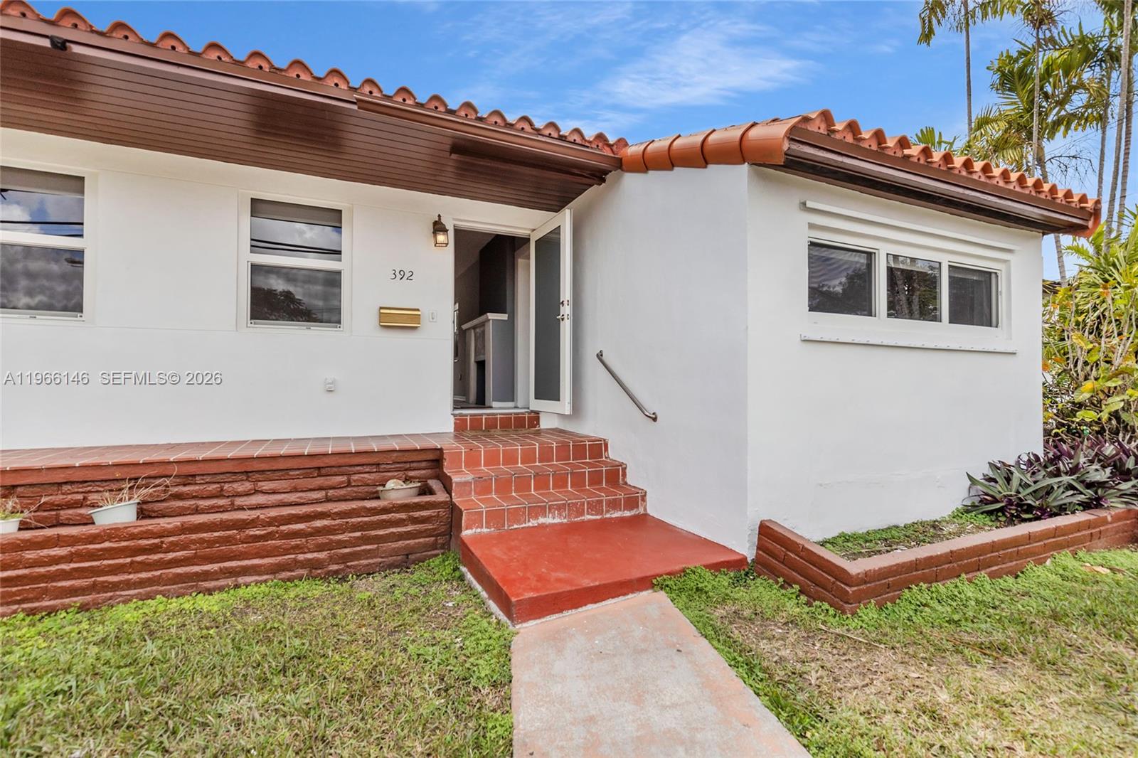Welcome to 392 Payne Dr located in the heart of Miami Springs. This Lakefront home boasts a huge 12,000+sqft backyard full of green space, perfect for pets and family occasions, and a rare lake view. It is a charming 3 bed 2bath home offering comfort, style, and space. Step inside to find impeccably maintained real hardwood floors that add warmth throughout, complemented by new impact windows, black out custom blinds, and impact doors for peace of mind and energy efficiency. Enjoy a brand-new AC system, and new appliances. The spacious layout opens onto a freshly painted patio, perfect for relaxing or entertaining while enjoying the serene views. Nestled in a friendly neighborhood 15 minutes from everywhere in Miami, and around the corner from prince field, playground, and the Miami springs community center and multiple A rated schools. this property combines classic Miami Springs charm with modern upgrades- a rare rental opportunity that truly feels like home.