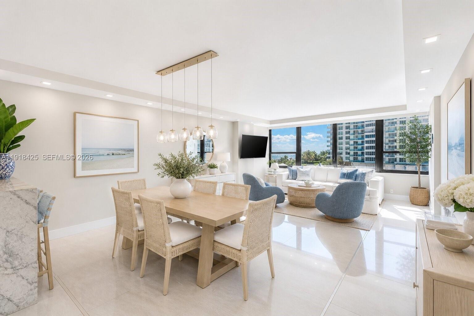 Welcome to this bright and modern residence at The Alexander, located on the south side of the building with sun all day. The home features an open living and dining area, a contemporary kitchen with island seating, and a private balcony overlooking the pool and ocean. The primary bedroom offers generous closet space and an en-suite bathroom, while the second bedroom has a full closet with a bathroom located across the hall. Additional features include an in-unit washer and dryer and tile floors throughout. Residents enjoy a direct beachfront location on Collins Avenue with easy access to the ocean, perfect for morning walks or taking your bike along the boardwalk. Resort-style amenities at The Alexander include two outdoor pools, an on-site restaurant and poolside bar, a fitness center with sauna, spa services, beach service, and valet parking. Owners have the flexibility to participate in the hotel rental program or rent the unit privately, offering an excellent opportunity for both personal use and income potential. A relaxed, welcoming home with every convenience at your doorstep.