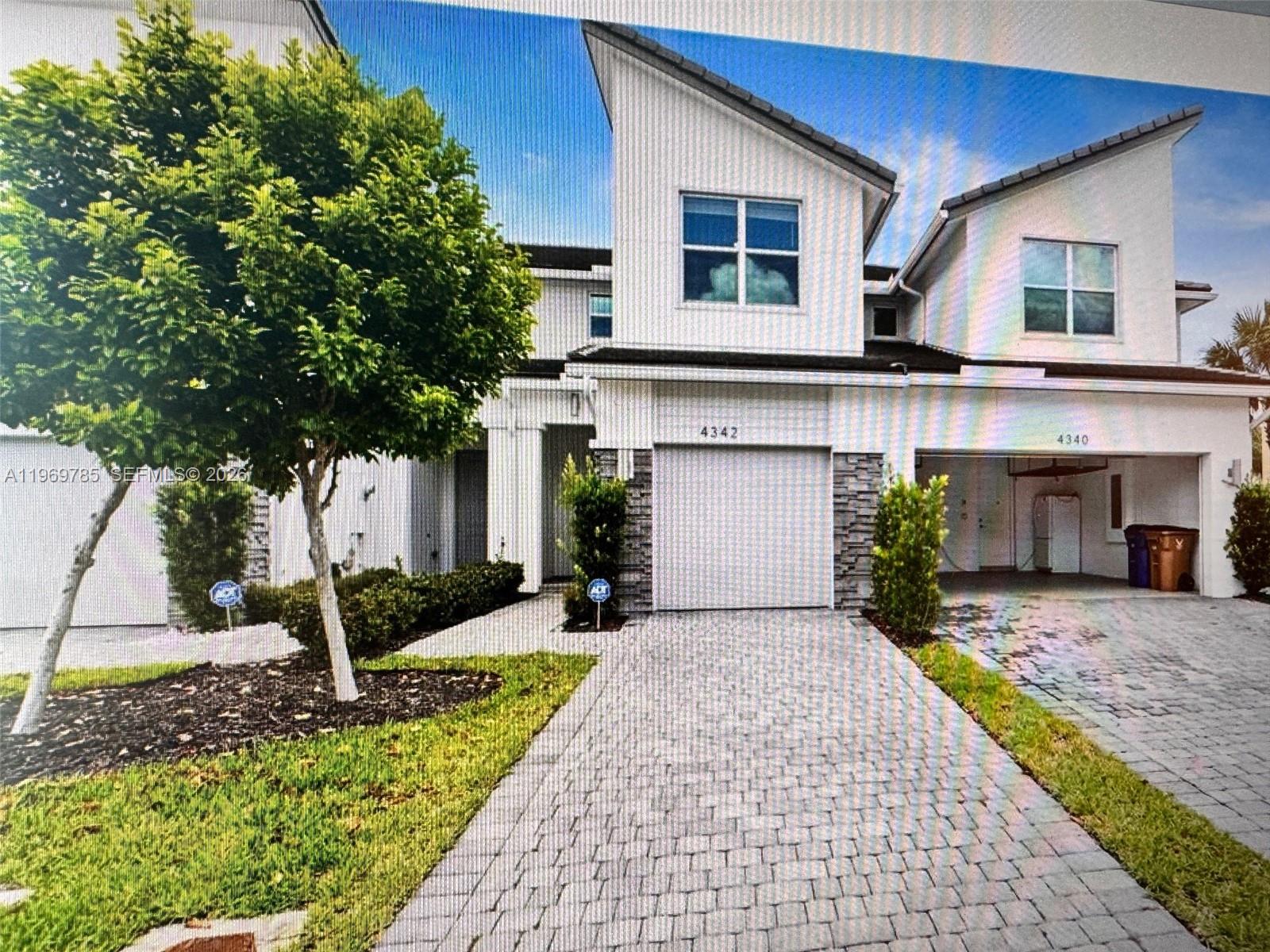 Stunning modern townhome offering 2 bedrooms, 2.5 baths plus a versatile loft, nestled within the prestigious gated enclave of Veleiros at Crystal Lake.
Constructed in 2020, this impeccably maintained residence is presented in pristine, move-in-ready condition—truly turnkey luxury living at its finest.
Residents enjoy an extraordinary resort-style lifestyle with access to a grand clubhouse featuring a state-of-the-art fitness center, dedicated children's play area, elegant social spaces, a screened picnic pavilion, expansive lounging deck, and a breathtaking beach-entry freeform pool surrounded by lush tropical landscaping.
Perfectly positioned in this sought-after master-planned community, this exceptional townhome combines contemporary coastal elegance with unparalleled amenities—ideal for discerning buyers seeking sophistication, convenience, and resort-inspired serenity.