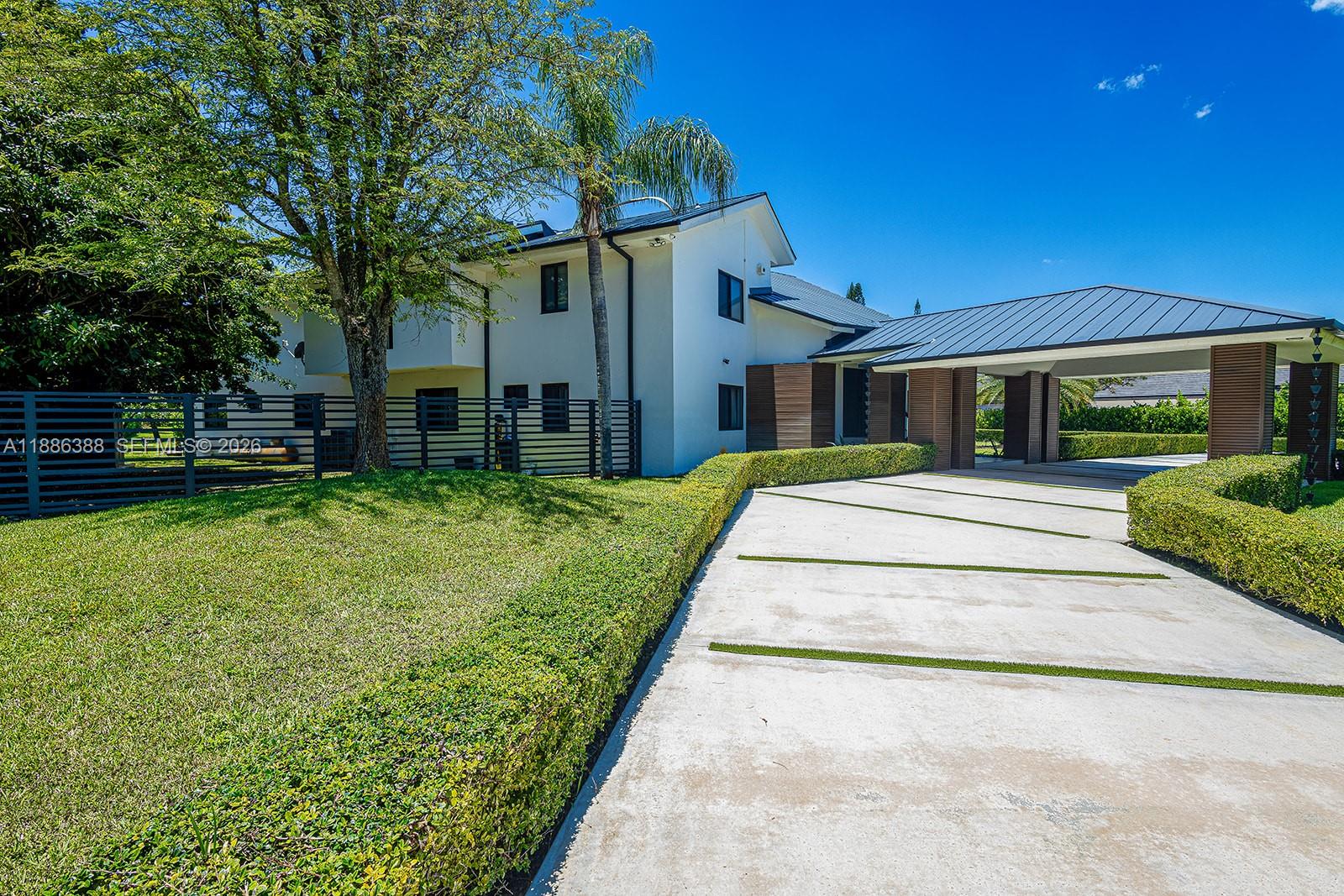 Experience the ultimate in modern elegance with this fully renovated, custom-designed residence set on 40,075 sqft lot in the prestigious Galloway Glen neighborhood. This 6-bedroom, 5-bath masterpiece showcases a triple-split floor plan and nearly 6,832 sq ft of interior living space, 48x48 European porcelain tiles, LED lighting, sleek aluminum railings, and rich custom walnut wood accents. Entertain effortlessly with resort-style amenities, swimming pool, spa, tennis and basketball courts, and a custom outdoor BBQ kitchen. The luxurious primary suite offers a private bar, custom walk-in closets, a spa-inspired bath with sauna, and balconies overlooking the pool. Addt'l features: Metal roof, impact-rated windows and doors, and a 3 car garage.