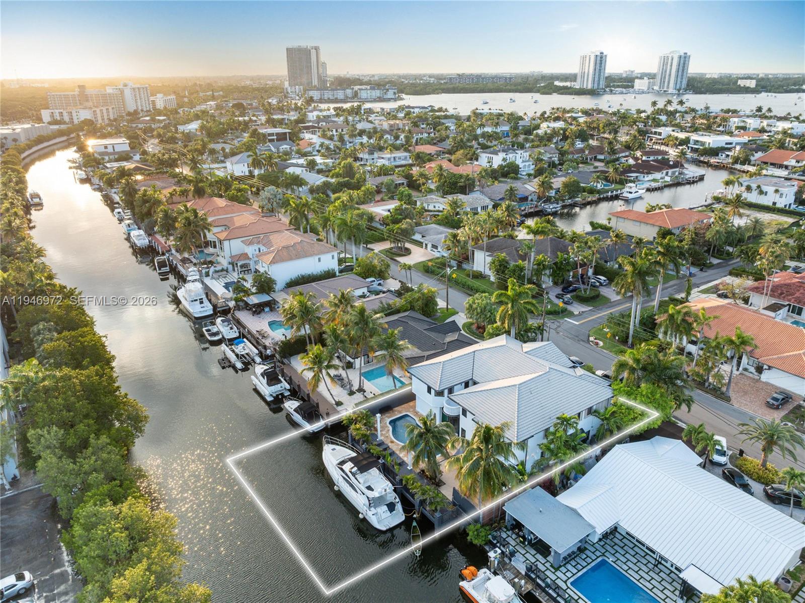 Waterfront living with private dock in the heart of Eastern Shores, between Aventura, Sunny Isles, and Bal Harbour.  This exceptional 6-bedroom, 4.5-bathroom,20-feet ceiling residence offers an impressive blend of modern design, comfort, and functionality across 6,000 square feet of interior space under AC . Designed for both everyday living and grand entertaining, the home features expansive living areas, a sleek chef’s kitchen with premium appliances,Movie theater, a pool, a private dock for boats,  and a luxurious primary suite with a spa-like bathroom and a private sitting area, impact windows, 2 AC units, and a 2-story. Enjoy seamless indoor-outdoor living with a resort-style backyard showcasing a heated pool, spa, and covered entertaining areas. With approximately 100+ feet of waterfront and direct ocean access, this property is a boater’s dream. Ideally located just minutes from  beaches , Shoppings, Schools rate A, Sunny Isles Beach, Oleta River State Park, and premier shopping and dining, this home offers privacy, prestige, and the ultimate South Florida lifestyle.