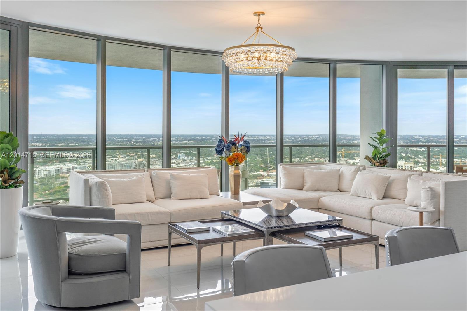 Stunning, furnished 42nd floor condo in 100 Las Olas. Enjoy luxury indoor-outdoor living in this 2,658 sq ft residence. 3 bedrooms + den, 3.5 bathrooms. Spacious open floor plan. Floor to ceiling windows, great natural light, large terraces, spectacular sunsets & river views. Professionally furnished with designer custom furniture & lighting.  Marble floors, high-end finishes. Fully equipped gourmet kitchen: European cabinets, quartz countertops top of the line appliances. Wet bar & wine cooler. Primary suite features 2 walk-in closets, luxuriously appointed bathroom. 2nd & 3rd bedrooms have ensuite baths, walk-in closets. 2nd bedroom has a private terrace. Laundry room with full size washer, dryer.  2 side by side assigned parking spaces & storage unit included.  5-star resort-style amenities: 24/7 concierge desk, rooftop pool, club room, fitness room, above Harbourwood on-site restaurant and Eddie V's.  Next to beautiful Hizuenga Park & steps to Las Olas shopping, dining & more.
