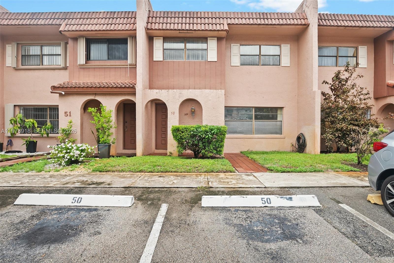 BACK ON THE MARKET!! Spacious 3 bed/2.5 bath townhome in the heart of Davie! Ceramic tile downstairs, laminate flooring upstairs, updated kitchen and upstairs bathrooms. Great location! Centrally located near highways, restaurants, shops and colleges. 2 assigned parking spaces directly in front of the unit and plenty of guest parking. Pet friendly community with ammenities including pools, tennis courts, children's playground and clubhouse. Sold As-Is. HOA application is attached, association approval is required. No rental the first 2 years. Come and make this beautiful home yours!