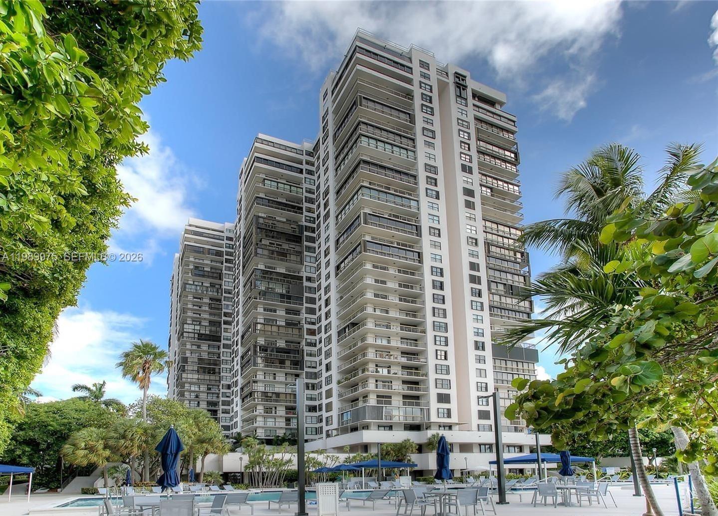 Stunning view from the 26 floor, Bay view and Coconut Grove. Largest one bedroom and one and a half bath on Brickell Avenue, excellent distribution,  with 965 square feet of A/C, and 72 square feet of terrace. Laminated Brown floors through out unit, carpet in the bedroom. Washer & Dryer inside unit, 1 assigned covered parking space, amenities include heated pool, 4 tennis courts plus a pickell court, state of the art fitness center with his and hers steam and sauna, kids playroom,Beauty salon, convenience store , 24 hour security in lobby and gate, valet 24/7. There is a tenant until July 31, 2026