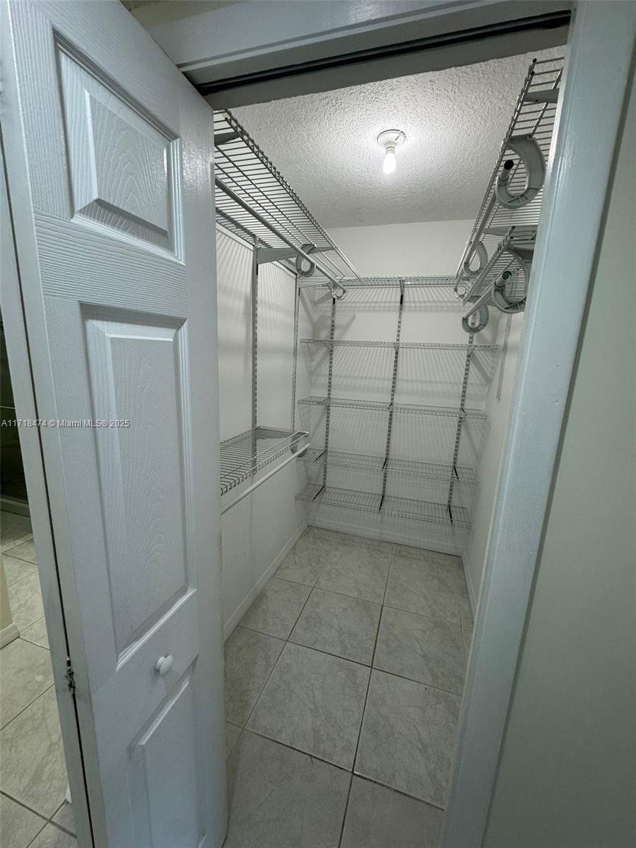 RACQUET CLUB APARTMENTS A - Residential Lease