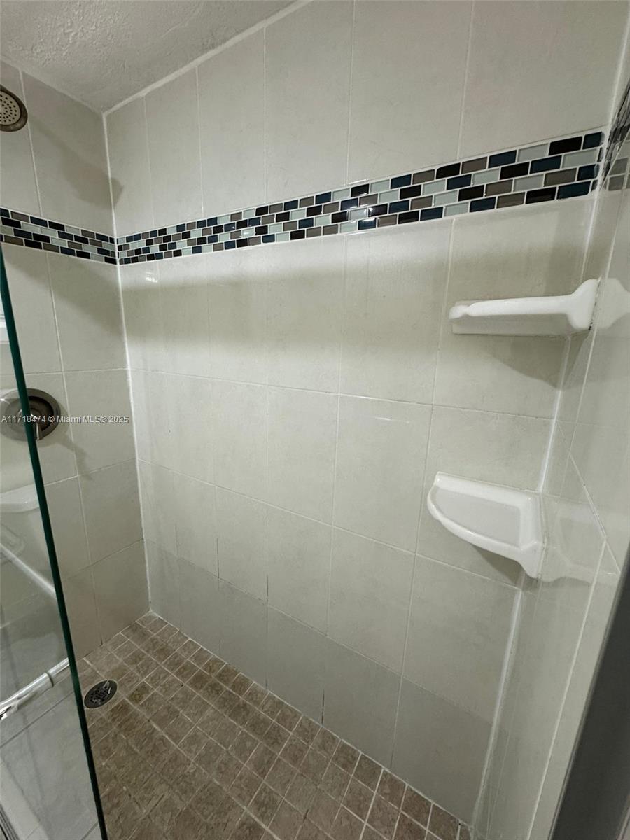 RACQUET CLUB APARTMENTS A - Residential Lease