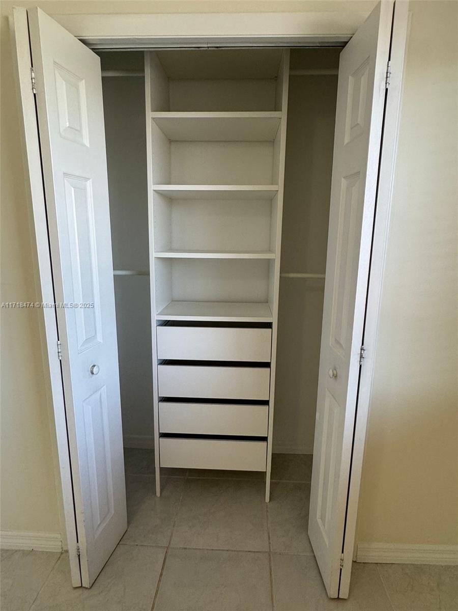 RACQUET CLUB APARTMENTS A - Residential Lease