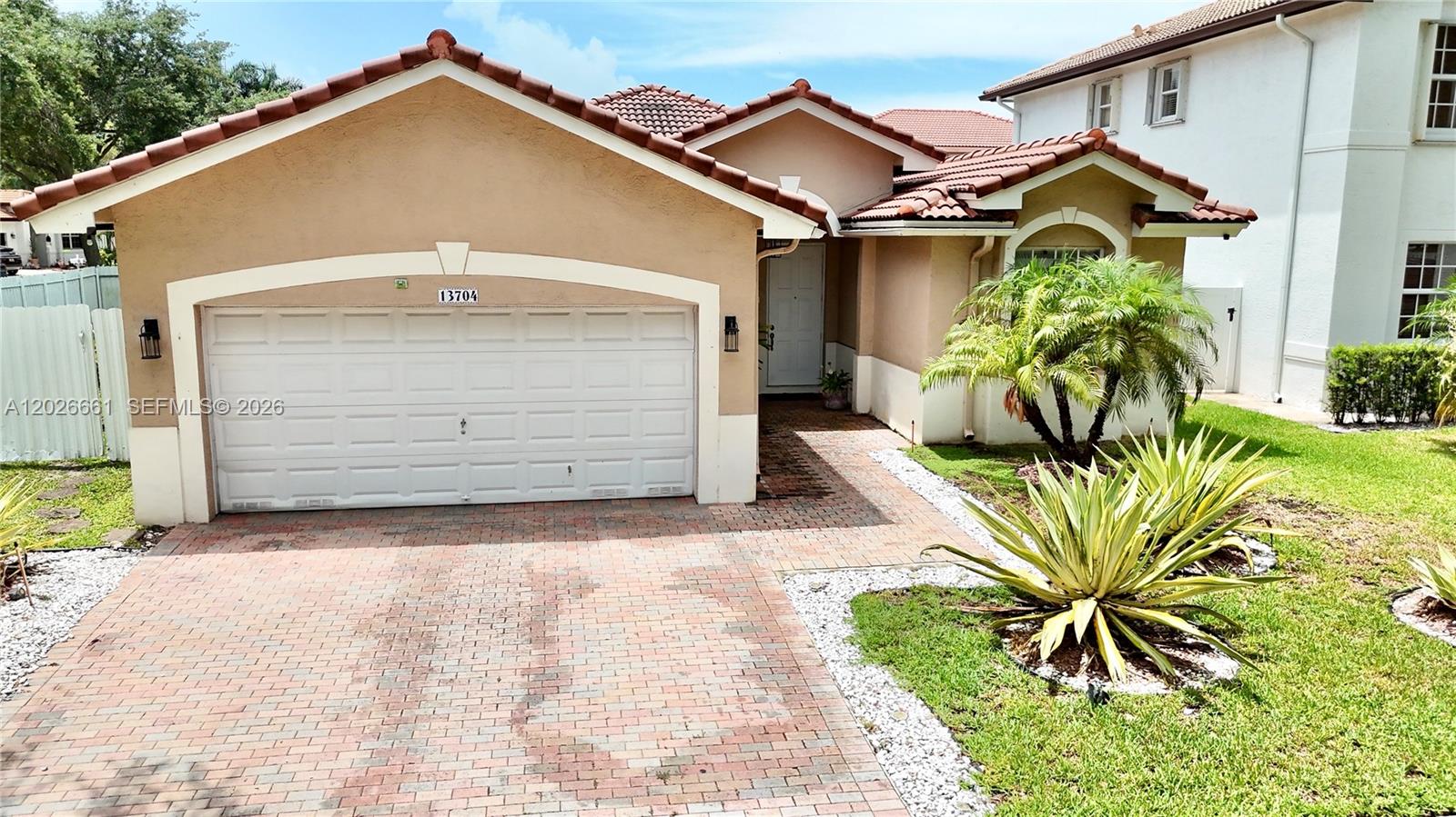Beautiful 3-bedroom, 2-bathroom home located in the desirable Monarch Lakes community in Miramar. This well-maintained property features approximately 1,667 SF of living area and sits on an oversized 7,800+ SF lot with a spacious backyard perfect for entertaining, pets, family gatherings, or future outdoor enhancements. The home includes a covered 2-car garage plus additional parking space for multiple vehicles, a functional layout, and solar panels that help improve energy efficiency and reduce monthly electric costs. Conveniently located near major highways, shopping centers, dining, schools, and parks.