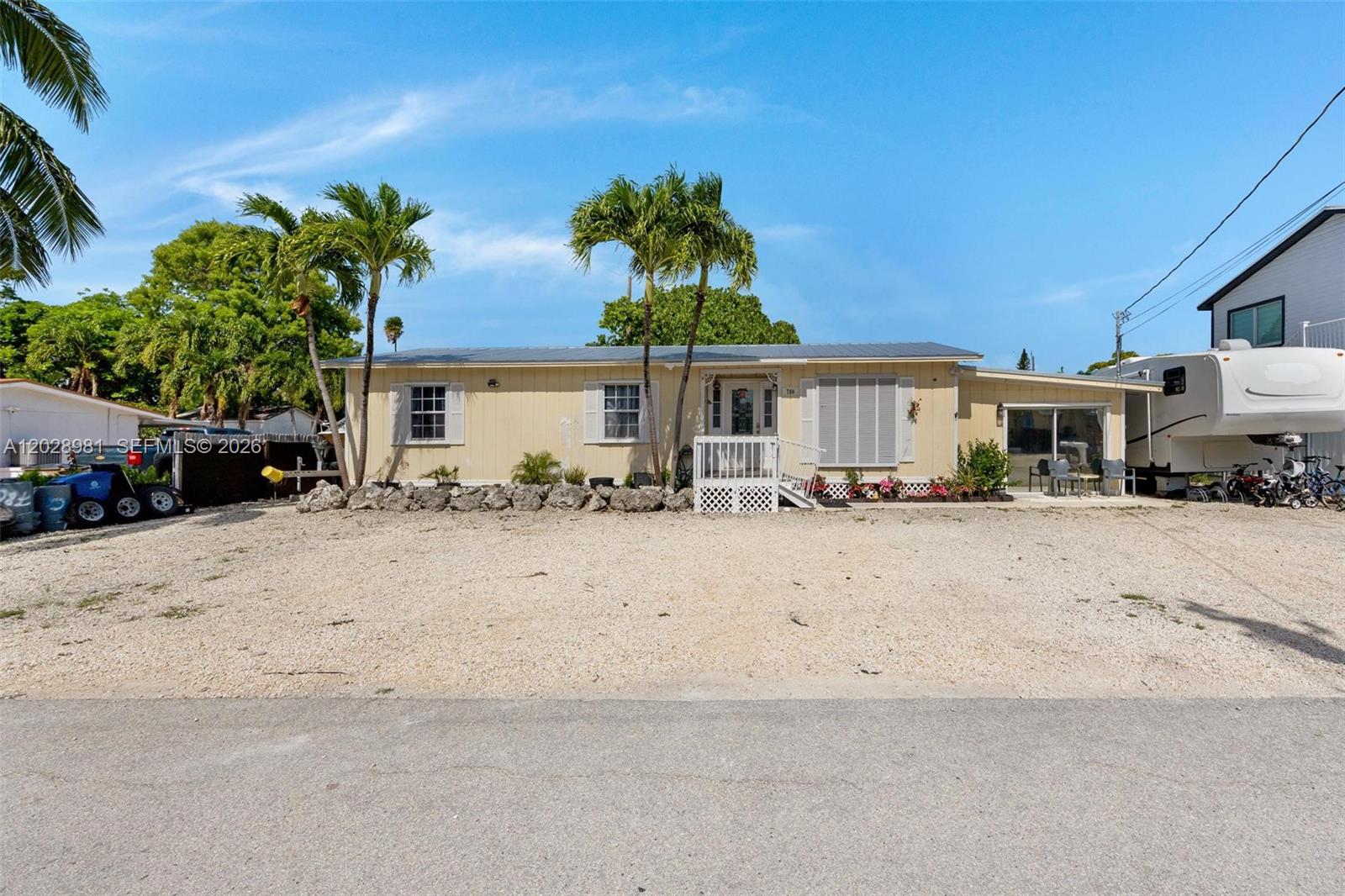 New on the market in the heart of Marathon, FL! This property offers a great opportunity to own in one of the most convenient areas of the Florida Keys, just minutes from local shops, dining, marinas, beaches, and island attractions. Conveniently located across from the airport, this home features a brand-new metal roof, a fully fenced yard, and zoning that allows short-term vacation rentals with a 7-night minimum. Whether you are looking for a personal Keys getaway, a second home, or an income-producing vacation rental, this property offers great potential. Enjoy the relaxed island lifestyle while also taking advantage of the strong rental demand in Marathon. RV and metal shed are not included in the sale.