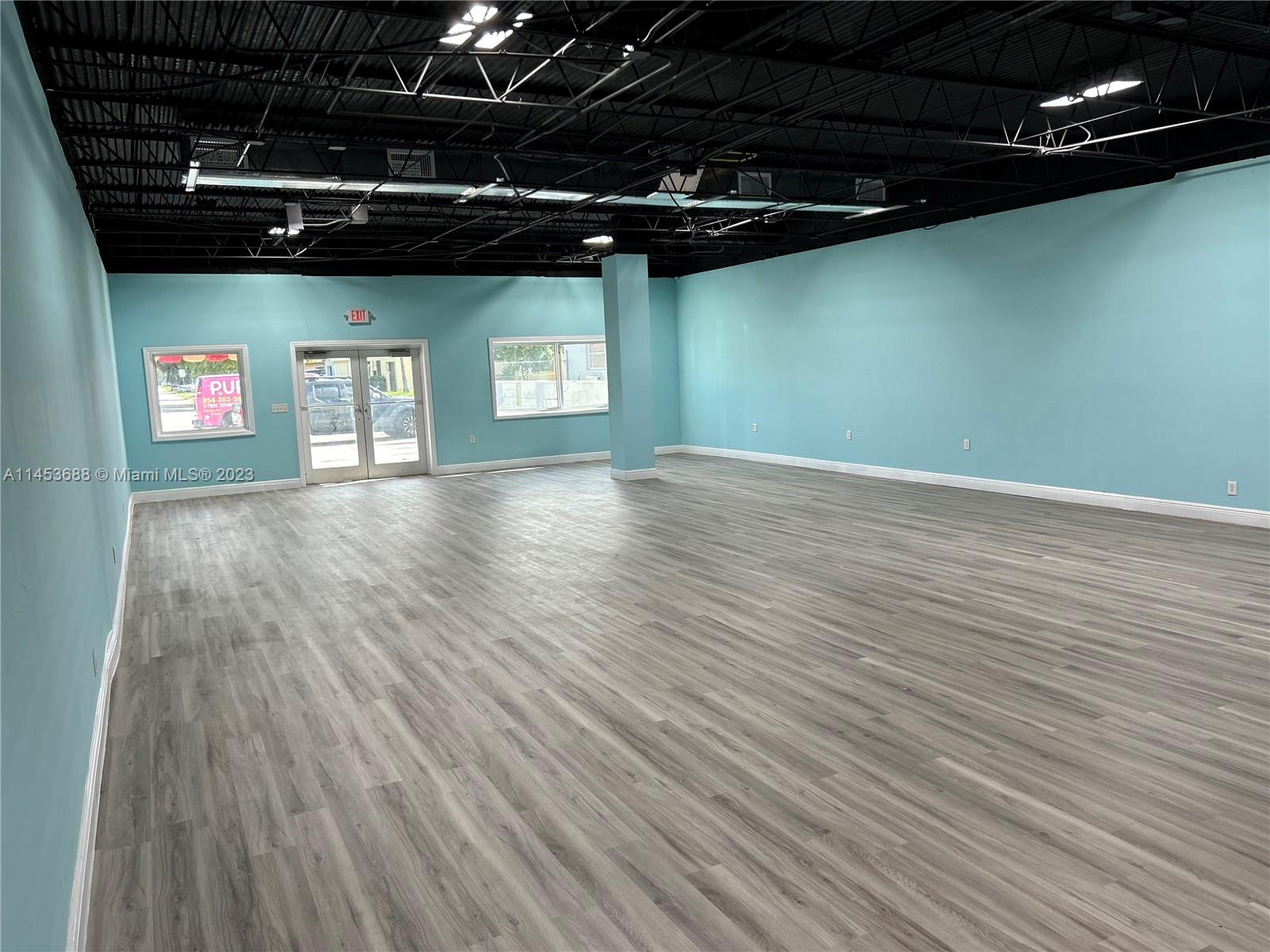 The ONLY Retail FREE STANDING COMMERCIAL BUILDING IN PEMBROKE PINES FOR SALE under $700,000
 Why pay high rent and deal with a landlord when you can OWN your space for your business!!!
Remarkable opportunity in a hot location with heavy traffic on busy Johnson Street near University Drive. Free standing building with land.  Nice Open Layout, tall ceilings. 
New Floors, New Paint.  Wide Open Space can be used for many, many uses.  
extra storage in back. Open fenced in area also in back. CBS construction. Newer AC Units.  6- 7 parking spaces in front. Currently licensed as Grooming and Pet Shop.  General retail office, Liquor Store, adult daycare, special medical or education, dance or karate school.  Verify all proposed uses first with City of Pembroke Pines before showing requests.