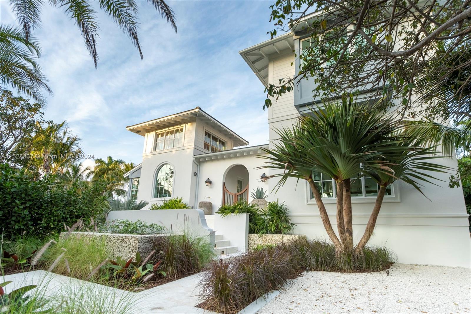 An Anglo Caribbean style 6 bedroom custom home built around an interior courtyard on oversized corner lot. Great sun exposure, brand new construction and professionally designed by James Duncan Designs.