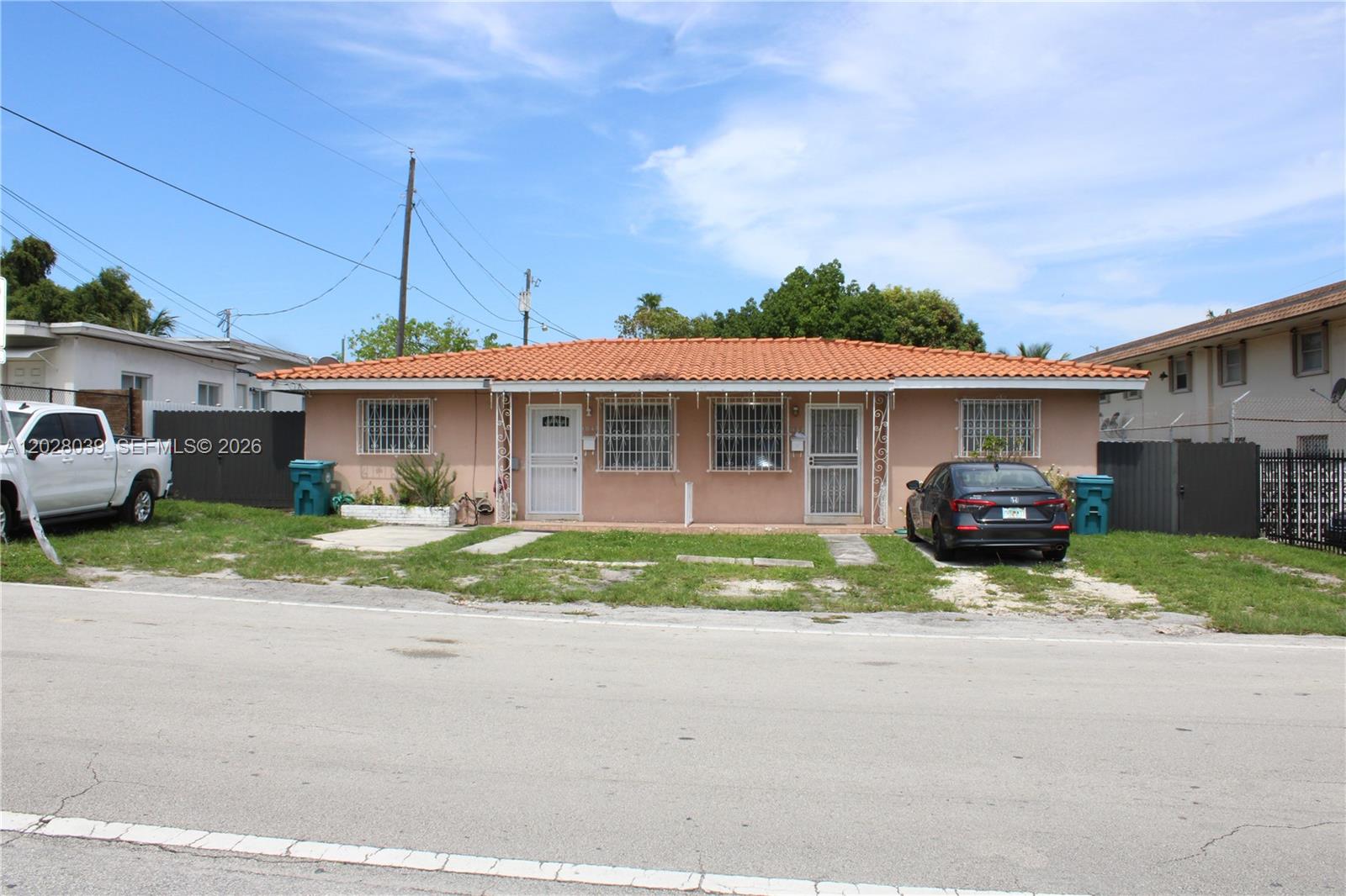 Income-producing duplex located in a growing Miami neighborhood with strong long-term upside potential. This property features two separate 2-bedroom, 1-bath units, offering an excellent opportunity for investors seeking rental income or owner-occupants looking to offset expenses with additional rental revenue. Situated on a spacious lot, the property is conveniently located near major highways, Miami International Airport, shopping, dining, schools, and public transportation. Just minutes from Midtown Miami, Wynwood, and Downtown Miami, this location offers easy access to some of the city's most desirable destinations. Tenant occupied. Showings by appointment only. Please do not disturb tenants.