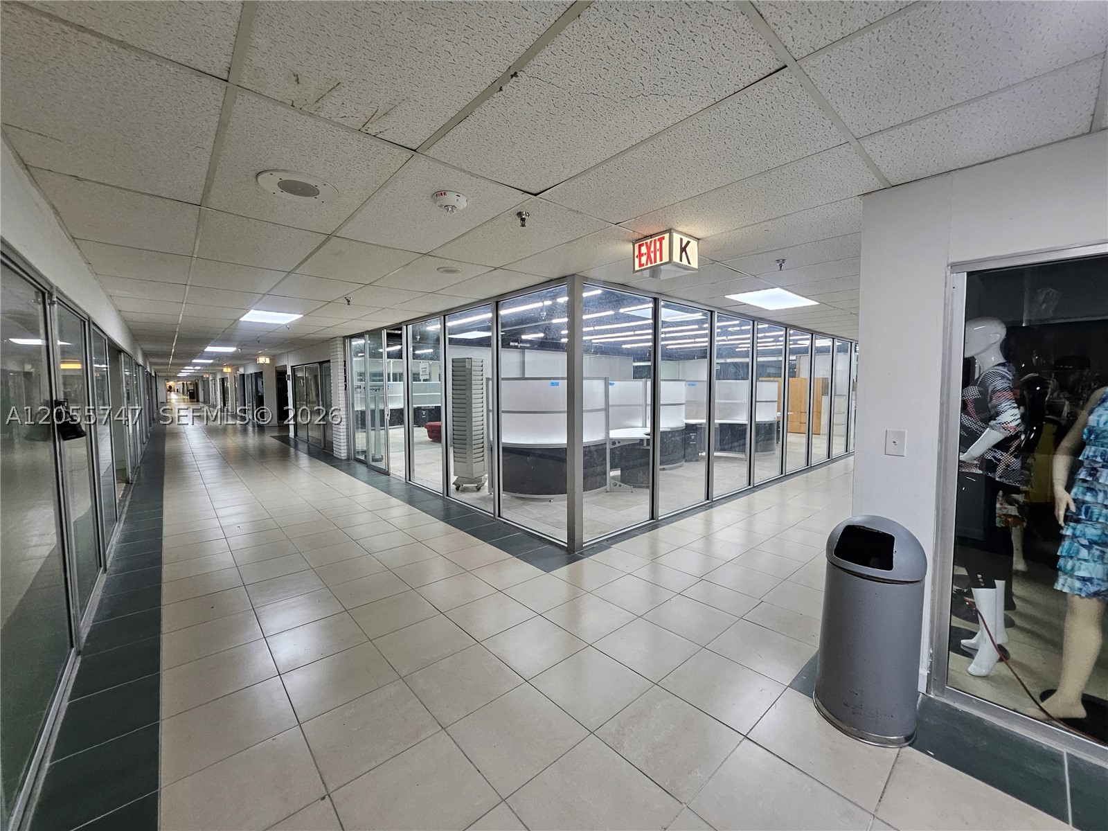Prime commercial space available for lease in the Miami Merchandise Mart at the DoubleTree Hotel. This 1,098 SF second-floor corner unit features two entrances, floor-to-ceiling glass frontage, and outstanding visibility. Ideal for wholesale, retail, office, showroom, or service businesses. Conveniently located across from Miami International Airport with easy access to the 826 (Palmetto) and 836 (Dolphin) Expressways. Water and electricity are included through the association. Furnished option available—call for pricing. Rent: $1,300/month.