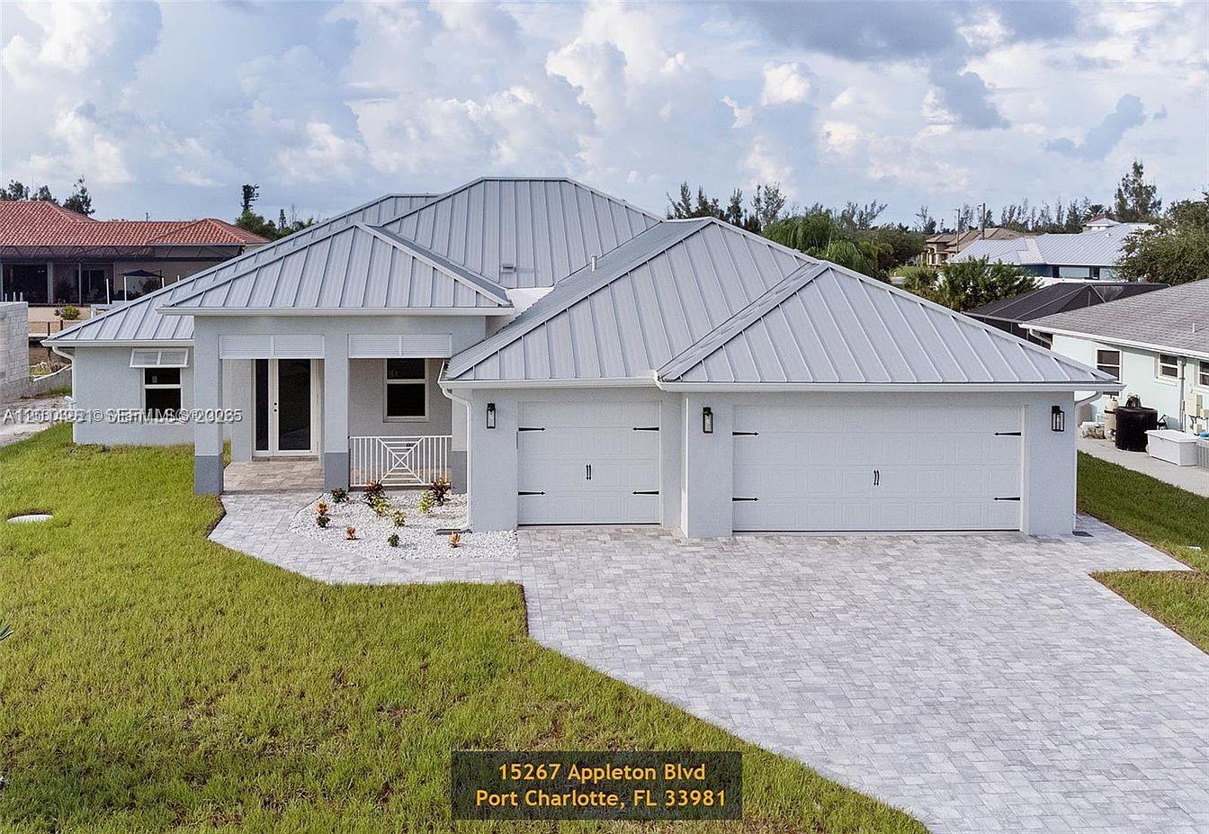 Experience refined waterfront living in this newly built 3-bed, 2.5-bath home plus a private office/den, designed to capture stunning water views from nearly every room. Enjoy seamless indoor-outdoor living with direct access to the lanai and pool from the primary suite, kitchen, family room, and guest bedrooms.
Inside, a bright open floor plan features soaring ceilings, abundant natural light, imported Spanish porcelain tile, and a spacious great room framed by French doors and a large picture window overlooking the water. The chef’s kitchen is the centerpiece, showcasing a dramatic 12-foot double-sided waterfall quartz island, premium stainless-steel appliances, quartz counters and backsplash, soft-close cabinetry, and ample storage. The primary suite offers a private retreat with two custom walk-in closets and a spa-like bath with dual vanities, rainfall shower-heads, soaking tub, and direct pool access. Built for quality and durability with impact windows and doors, solid-core doors, high-efficiency A/C, spray-foam insulation, a 3-car epoxy garage, and a standing-seam metal roof. The screened lanai features a covered entertaining area, wood ceilings, cabana bath, travertine flooring, and serene waterfront views with an 80-ft seawall. Located in South Gulf Cove with direct sailboat access to the Gulf, near beaches, golf, dining, and shopping. Some photos virtually staged.