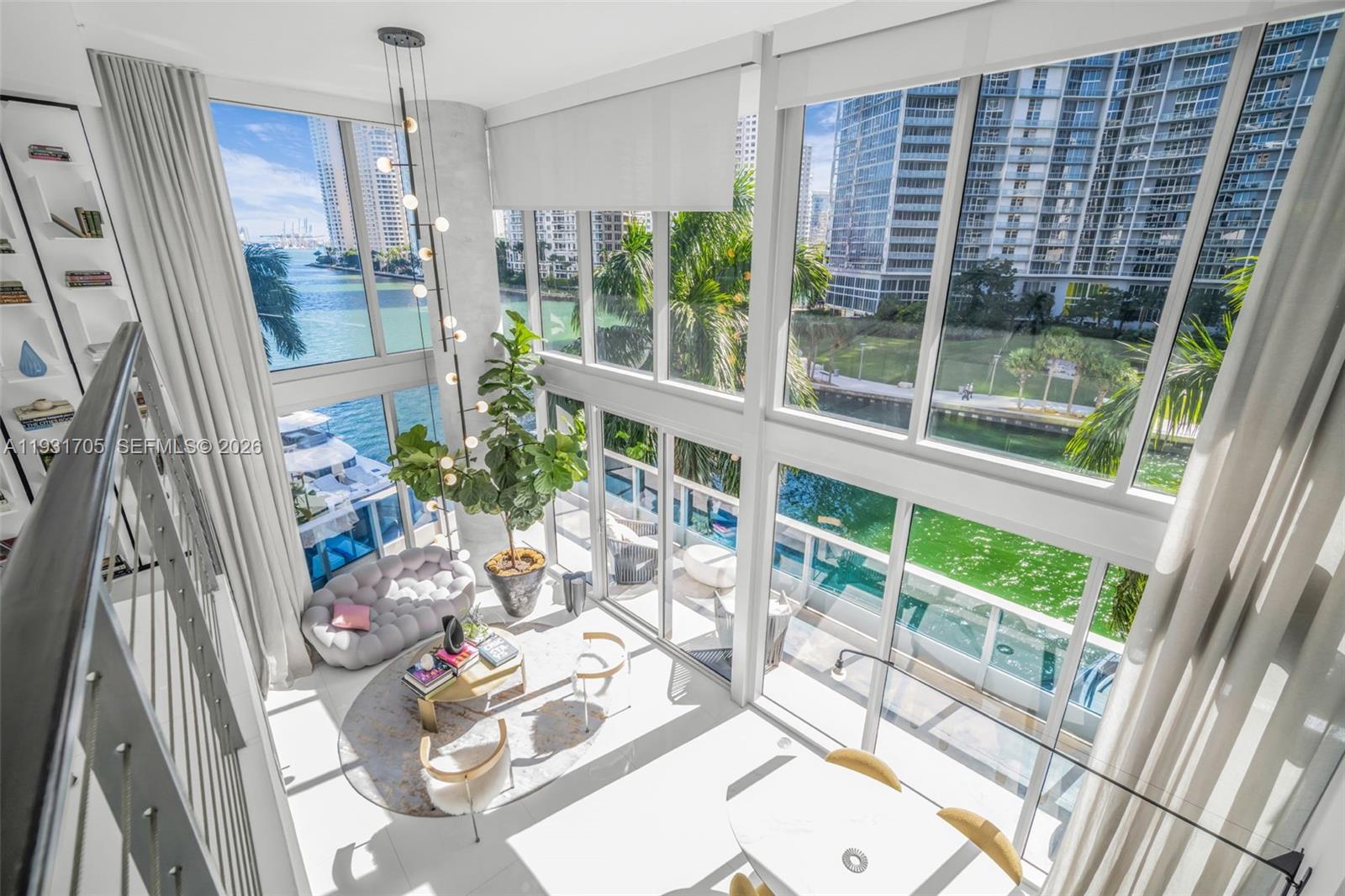 Experience elevated living at Epic Residences in this exceptional townhouse-style corner home, designed for the affluent buyer who values architecture, privacy, and a fully integrated luxury lifestyle. Dramatic two-story ceilings and floor-to-ceiling glass flood the interiors with natural light, framing sweeping 270-degree ocean, Miami River, and city views. Over 400 sq ft of expansive terraces, including a 6-foot-deep 311 sq ft lower balcony and an additional upper terrace, create seamless indoor-outdoor living ideal for entertaining or quiet retreat.

The residence is finished with refined Italian design throughout, featuring a Snaidero kitchen, Miele appliances, a Sub-Zero refrigerator, marble bathrooms, custom built-in closets, premium Italian tile flooring, one dedicated parking space, and additional storage. Every detail reflects understated elegance and thoughtful craftsmanship.

Residents enjoy resort-style living with three pools, a full-service spa, wellness center, fitness facility, Privai Spa, poolside bar, room service, and exclusive privileges including Zuma, Area 31, complimentary weekly movies at Silverspot Cinema, and membership access to Joia Beach Club. Steps from Brickell City Centre and Mary Brickell Village, with easy access to Downtown, Miami Beach, and major highways. Epic offers 100% fully funded reserves with no special assessments.

Schedule your private showing today and experience Epic Residences living at its finest.