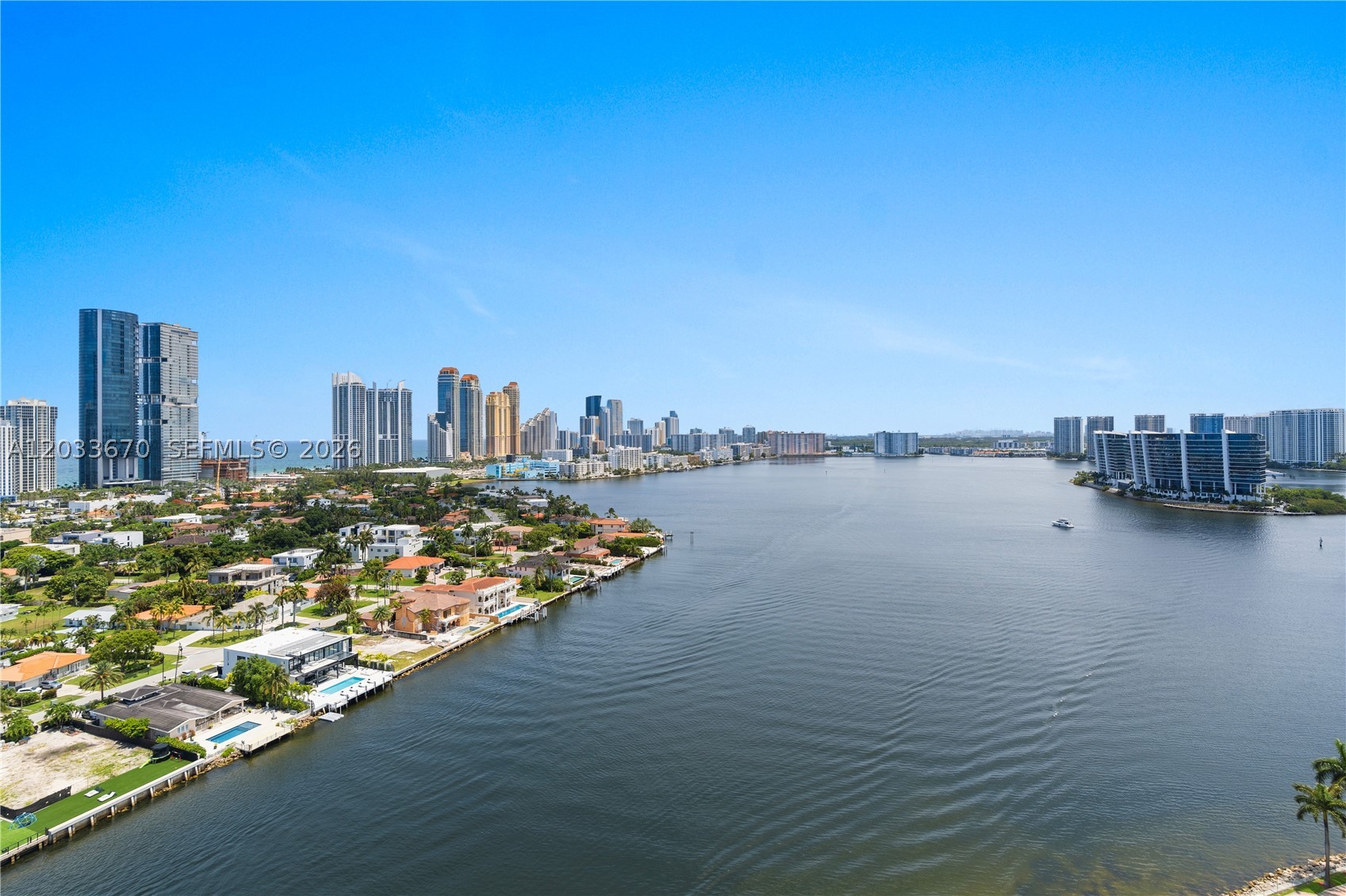 Experience waterfront living from one of the most desirable corner condos in Mystic Pointe Tower 100. This exceptional 2-bedroom, 2-bathroom condominium is situated on the community's premier line, showcasing breathtaking panoramic views of the Intracoastal Waterway, Atlantic Ocean, Sunny Isles skyline, and endless sunrises from virtually every room. Designed to capture natural light throughout the day, this spacious residence features floor-to-ceiling windows, generously sized bedrooms, an in-unit washer and dryer, and an expansive wraparound balcony that directly faces the ocean and Intracoastal, creating the perfect setting for morning coffee, entertaining guests, or simply enjoying the spectacular waterfront scenery. The coveted eastern exposure offers beautiful sunrise views while avoiding the harsh afternoon sun. Hurricane shutters on all windows. Located within the prestigious gated community of Mystic Pointe, residents enjoy resort-style amenities including a waterfront pool, fitness center, tennis and pickleball courts, marina, walking paths, concierge, valet, and 24-hour security. Ideally positioned in the heart of Aventura, just minutes from Aventura Mall, Sunny Isles Beach, fine dining, shopping, golf, houses of worship, and both Miami and Fort Lauderdale airports. 
A rare opportunity to own one of the best view residences in Mystic Pointe and enjoy the ultimate South Florida waterfront lifestyle.