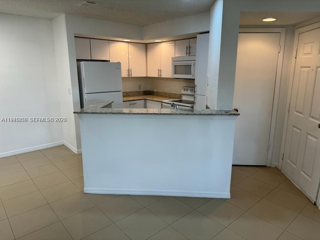 Excellent investment opportunity in Coral Key Condo, Margate. Well-kept unit in a community with no rental waiting period, all ages, and pet-friendly. Low HOA fees and strong rental demand make this property ideal for investors. Community offers pools, clubhouse, gym, tennis courts, and picnic areas. Centrally located near major highways, shopping, and public transportation.Tenant occupied. Please do not disturb tenants. Showings by appointment only.