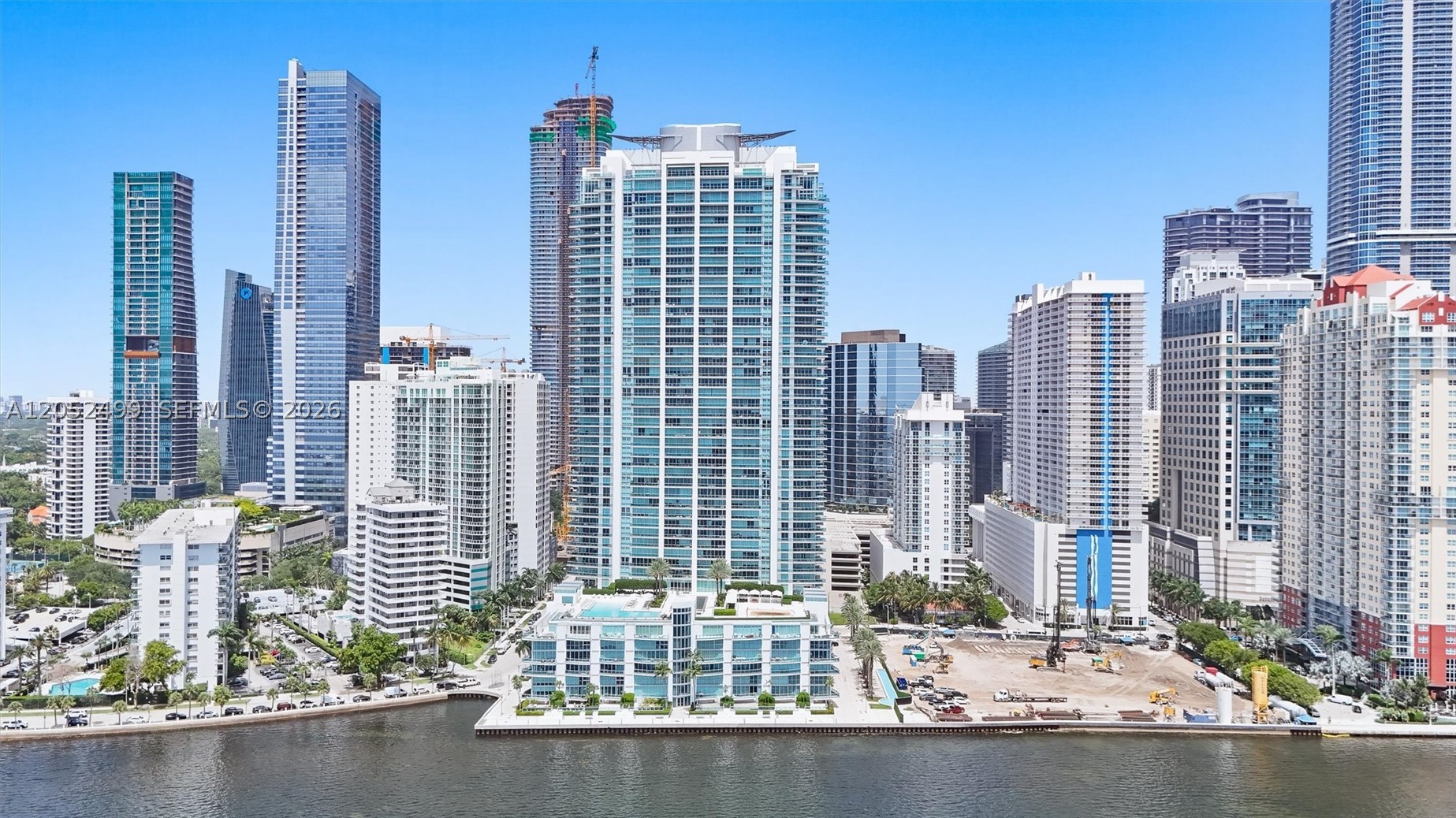 For the first time EVER on the market! Step inside this bi-level bay loft with endless views of Biscayne Bay and with over 400SF of private outdoor terrace for your entertainment and enjoyment. No elevator needed for this residence. Spacious interior features soaring 18' ceilings, floor-to-ceiling glass, custom Italian cabinetry, premium stone finishes, and professional-grade Sub-Zero and Miele appliances.

Jade Residences represents a refined waterfront sanctuary and unobstructed water views stretching toward Key Biscayne, Fisher Island, South Beach, and the Atlantic Ocean. Offering over 30KSF of resort-style amenities including a waterfront infinity pool, state-of-the-art fitness center, spa, concierge, valet, a business center, a rooftop sundeck, and 24-hour security.

Ideally situated on the tranquil southern and quiet edge of Brickell Bay Dr, residents enjoy walking proximity to the soon-to-be Santander and Citadel HQs, Brickell City Centre, Mary Brickell Village, world-class dining, shopping, and Miami's thriving financial district.