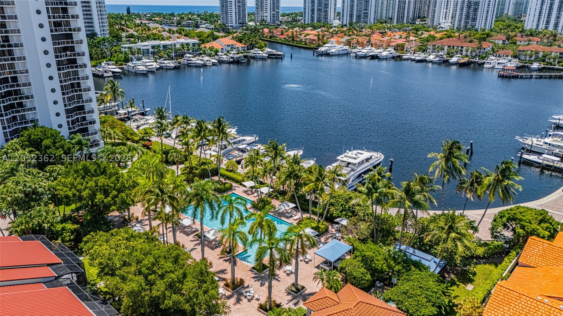 **2 COVERED PARKING SPACES + DEN!**

Beautiful condo in Harbor Towers Residences, located within the exclusive, guard-gated community of Aventura Waterways. This bright and spacious residence offers 2 bedrooms, 2 bathrooms, and a den. A generous balcony overlooks the tranquil canal. The kitchen opens to a casual breakfast area, while a separate laundry room adds everyday convenience. Floor-to-ceiling windows and sliding glass doors in every bedroom create a seamless indoor-outdoor connection and fill the home with natural light.

The primary suite features a spacious walk-in closet and a luxurious bathroom with dual sinks, a soaking tub, a glass-enclosed shower, and a bidet.

Harbor Towers offers a true resort lifestyle with an infinity-edge pool, spa, tennis courts, fitness center, clubhouse, BBQ area, and waterfront walking paths. Residents also enjoy a secure lobby, concierge services, complimentary valet, **two covered parking spaces**, and a private storage unit.

Ideally located just minutes from Aventura Mall, fine dining, shopping, parks, top-rated schools, and houses of worship, this residence offers the perfect blend of comfort, sophistication, and convenience.