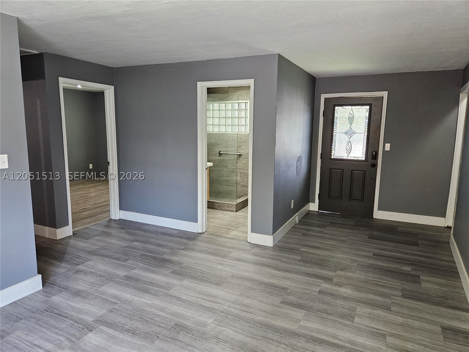 This inviting residence offers a perfect blend of comfort and style, with a range of features that will make you feel right at home. Wood laminate floors and upgraded kitchen & bath. The upgraded bathroom offers modern fixtures and finishes. Enjoy a private, fenced backyard and a cute front patio. Modern conveniences meet comfort in this inviting space. Washer/dryer hookups available. Conveniently located near schools, parks, and shopping. Your peaceful oasis awaits!