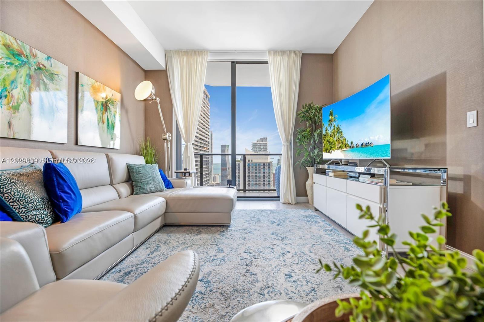 Live above it all on the 42nd floor of Brickell Heights East. This fully furnished 1-bedroom + den, 2-bath residence delivers a seamless blend of comfort and sophistication, featuring a smart layout, high-end finishes, and floor-to-ceiling views of the city skyline and bay from a spacious private balcony. Designed for elevated living, the unit includes custom built-ins, walk-in closets, and a fully equipped modern kitchen. Enjoy world-class amenities including a rooftop pool, state-of-the-art fitness center, spa, steam room, and 24-hour attended lobby. Ideally located in the heart of Brickell, just steps from Brickell City Centre, Mary Brickell Village, and Miami’s top dining and entertainment. Available for annual or short-term lease (90-day minimum).