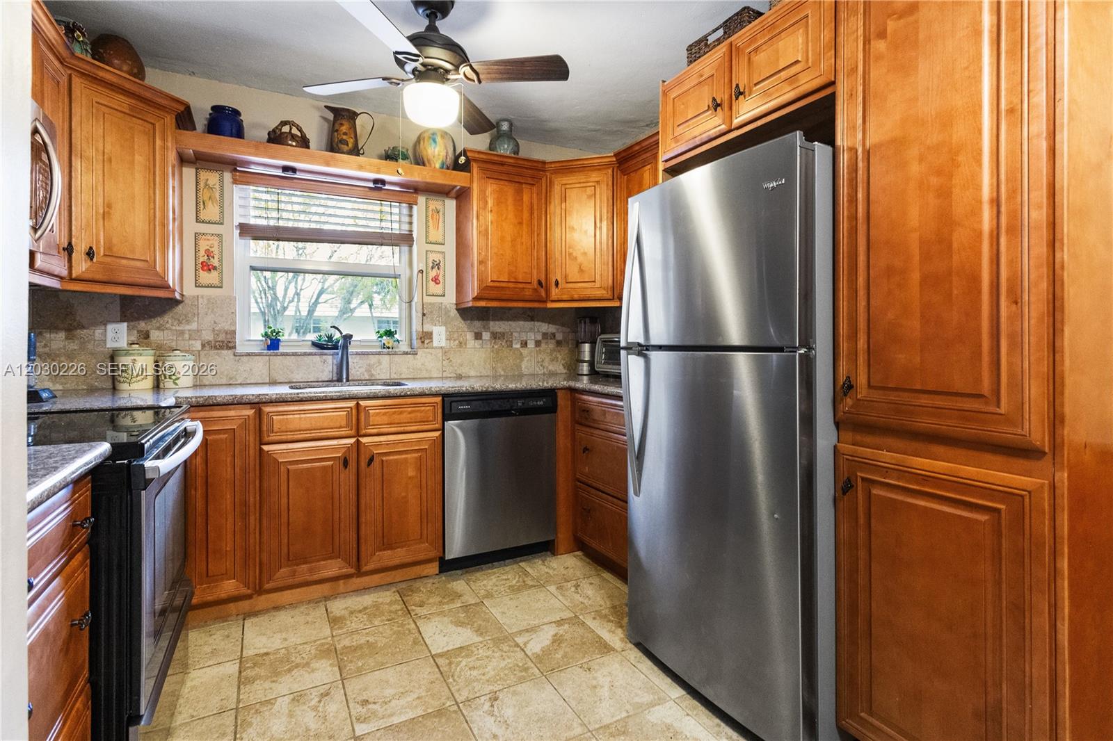 Purchase with 5% down.This well maintained 2-bedroom, 2-bathroom condo is located in a prime location with easy access to the beach, Young Circle, shopping, 9 hole golf course, and Fort Lauderdale Airport. Relax on the spacious screened patio. Inside, you'll find tile floors throughout, a kitchen boasting newer wood cabinets with ample storage, granite countertops and stainless steel appliances. Impact windows provide peace of mind. Community amenities include a BBQ area, swimming pool, and sauna. This condo welcomes all ages and small pets. Maintenance fees cover water, basic cable, and reserves plus more. Leasing is permitted after 18 months of ownership. New roof installed 2024.