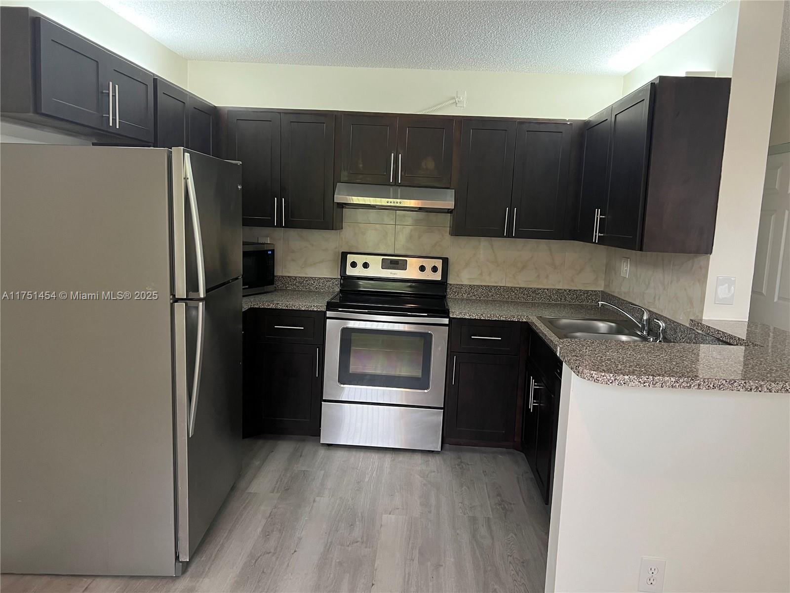 Beautiful unit on the corner of second floor; features 2 bedrooms and 2 bathrooms, updated kitchen with stainless-steel appliances, split bedroom plan, freshly painted, vinyl plank floors throughout, washer and dryer in unit. Near to shopping centers, public transportation, major freeways & schools.