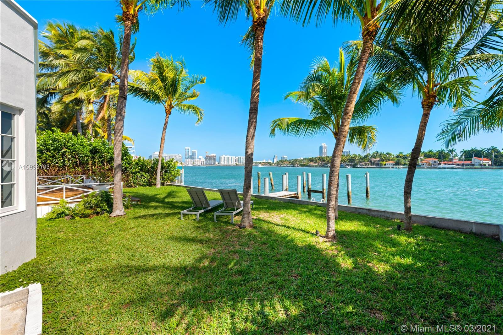 WEST COAST COOL MEETS KEY WEST TROPICAL VIBES. LUSH WATERFRONT PRIVATE RESIDENCE FEATURES 4 BEDROOMS/3.5 BATHS PLUS 1 BED/1 BATH SPACIOUS GUEST COTTAGE W/SEPARATE ENTRY WAY. BRIGHT, OPEN & BREEZY FLOOR PLAN INCLUDES LIVING AREA LINED WITH FRENCH DOORS ,  FORMAL DINING AREA, &  OPEN KITCHEN, ALL FEATURING SERENE WATER VIEWS FROM EVERY ANGLE. 2ND LEVEL CONSISTS OF MASTER BEDROOM & BATH AND FRENCH DOORS LEADING OUT ONTO SPACIOUS WOODEN SUN DECK WITH OPEN BAY VIEWS TOWARDS DOWNTOWN MIAMI AND LA GORCE ISLAND TO THE SOUTH. MAIN HOUSE 3,771 SQ FT + GUEST HOUSE IS APPROX 4,220 TOTAL LIVING AREA.