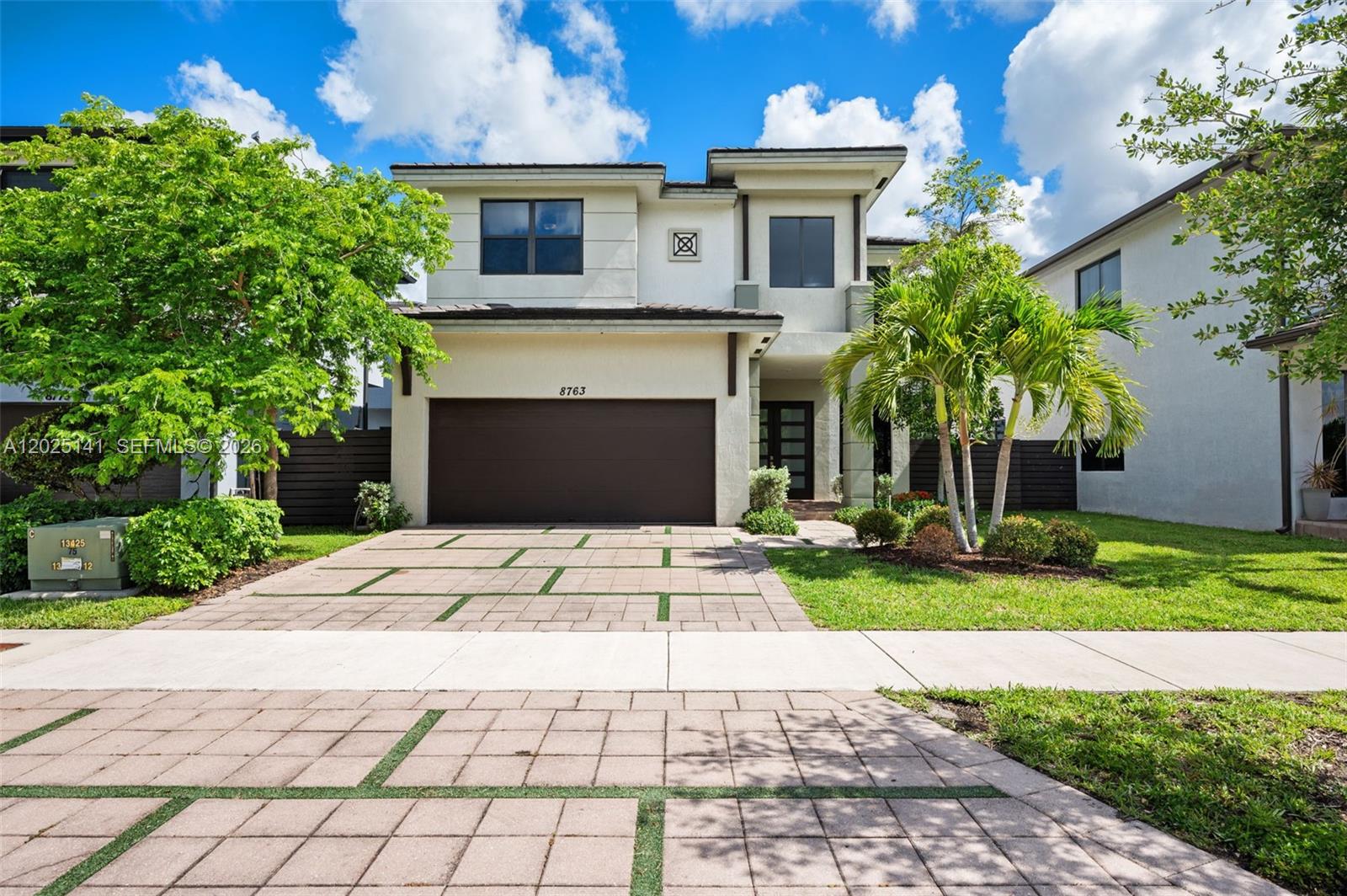 Welcome to Satori! This beautifully maintained 4-bedroom, 3-bathroom Nirvana model offers the perfect entry into one of Miami Lakes’ most sought-after gated communities. Featuring soaring 20-foot ceilings in the living room, an open-concept floor plan, and abundant natural light throughout, this home feels spacious and inviting from the moment you enter. Enjoy a nicely fenced backyard ideal for relaxing or entertaining, all located on a quiet street within the community. Residents of Satori enjoy resort-style amenities including a clubhouse, pool, fitness center, scenic walking paths, and beautifully maintained green spaces, all conveniently located near top-rated schools, shopping, dining, and major highways.