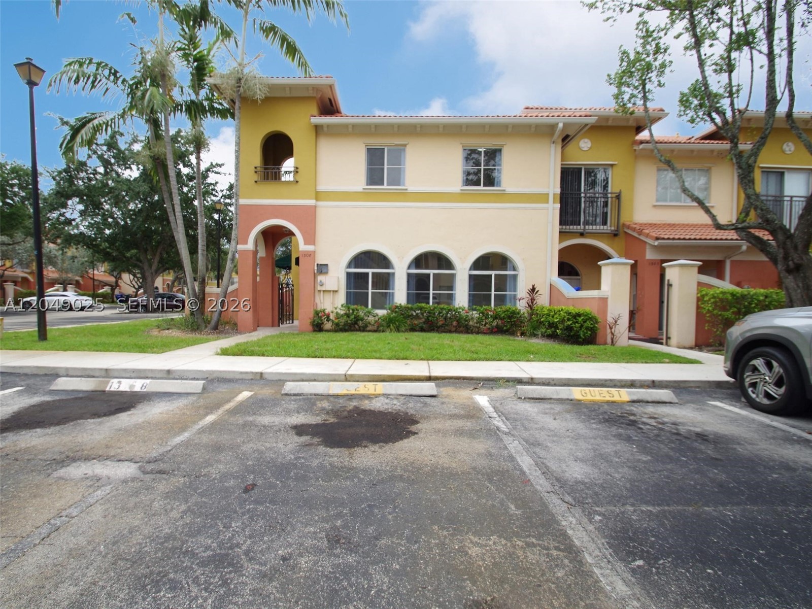 Beautiful and spacious 4-bedroom, 2.5-bathroom updated corner townhouse located in the highly desirable, well-maintained community of Santa Catalina. This bright and inviting home features a stunning kitchen equipped with elegant wood cabinetry, and granite countertops. The entire interior has been freshly painted and features clean wood flooring throughout. Also includes a private back yard and 2 porches. Residents will enjoy fantastic community amenities, including a refreshing swimming pool and the peace of mind offered by HOA security. Perfectly situated in a quiet neighborhood with easy access to shopping, dining, and major roadways. Don't miss this move-in-ready gem!