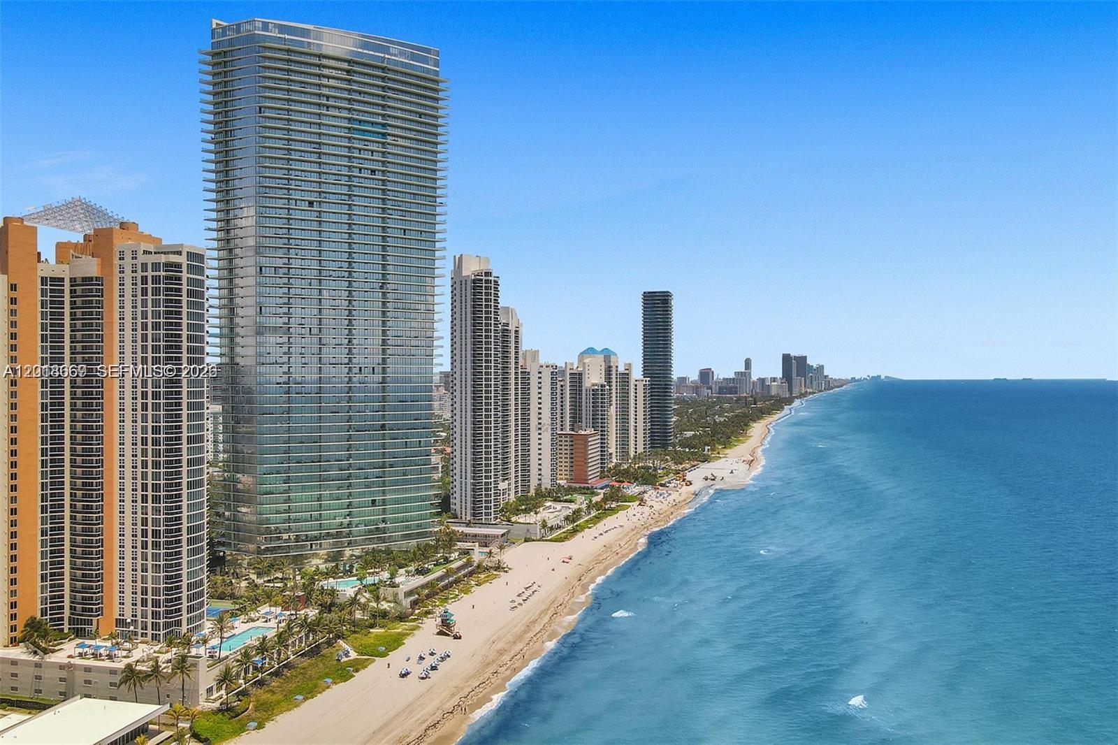 Enjoy elevated ocean-front living at the Residences by Armani Casa by world-class architect Cesar Pelli and interior design by the acclaimed fashion designer Giorgio Armani. This luxurious corner residence has direct, city and the intra-coastal views with a spacious open floor-plan and ten foot ceilings, allowing plenty of natural light throughout. Beautifully finished and furnished by a professional interior designer, this spectacular residence offers, 2 bedrooms plus a Den and 2.5 bathrooms. It boasts 1,592 sq ft. of interior space and a 400 sq ft balcony showcasing breathtaking views and equipped with a summer kitchen. Other features include, 10 ft. deep balconies, an Armani designed Dada kitchen featuring Wolf Sub-Zero appliances, and spa-like marble-clad Armani Roca bathrooms.