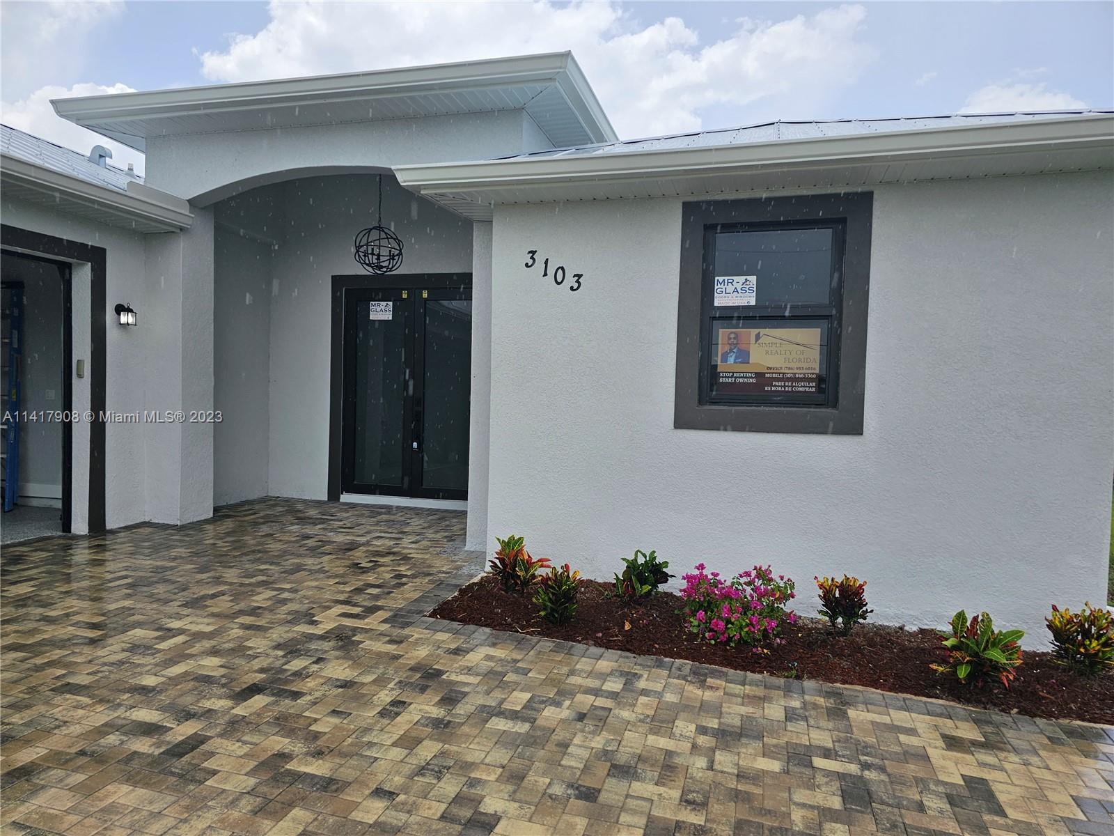 "HIGHLY DESIRABLE AREA OF LEHIGH" When it comes to new construction, you don't want to miss out on this opportunity. "Florida living at its best" 
Cinder block home, offering 3 bed 2 bath and good lot.
Open concept with split bedroom plan, which maximizes the use of space with tile throughout the home, granite counter tops, stainless steel kitchen appliances, impact resistant windows and doors, sprinklers around the hose, also with a metal roof.
This home is located in the rapidly growing area of Lehigh Acres. It will not last long. "Hablamos Español"
"Seller contribute with $5,000 closing cost help"