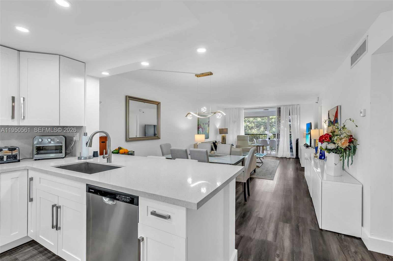 This is a must see, Fantastic opportunity in this Totally renovated 2 bed 2 bath oversized Condo. The moment you enter you will see the updated stylish modern look . Stunning quartz waterfall countertop, with square sink and gooseneck faucet ,new white kitchen cabinets , new appliances , textured modern flooring additional cupboard and closet space, new AC new HWtank ,new washer and dryer just about everything here is new and updated.This fresh and bright home has an oversized terrace for all day relaxing with lucious garden view ,or enjoy all the great amenties including pickleball,tennis, Billiards or many other great activities and clubs.Centrally located  with Fine Dining and Quality shopping all close by. Association says 45000$ income needed 710 credit score and 20% Down Rentals allowed after 1 year