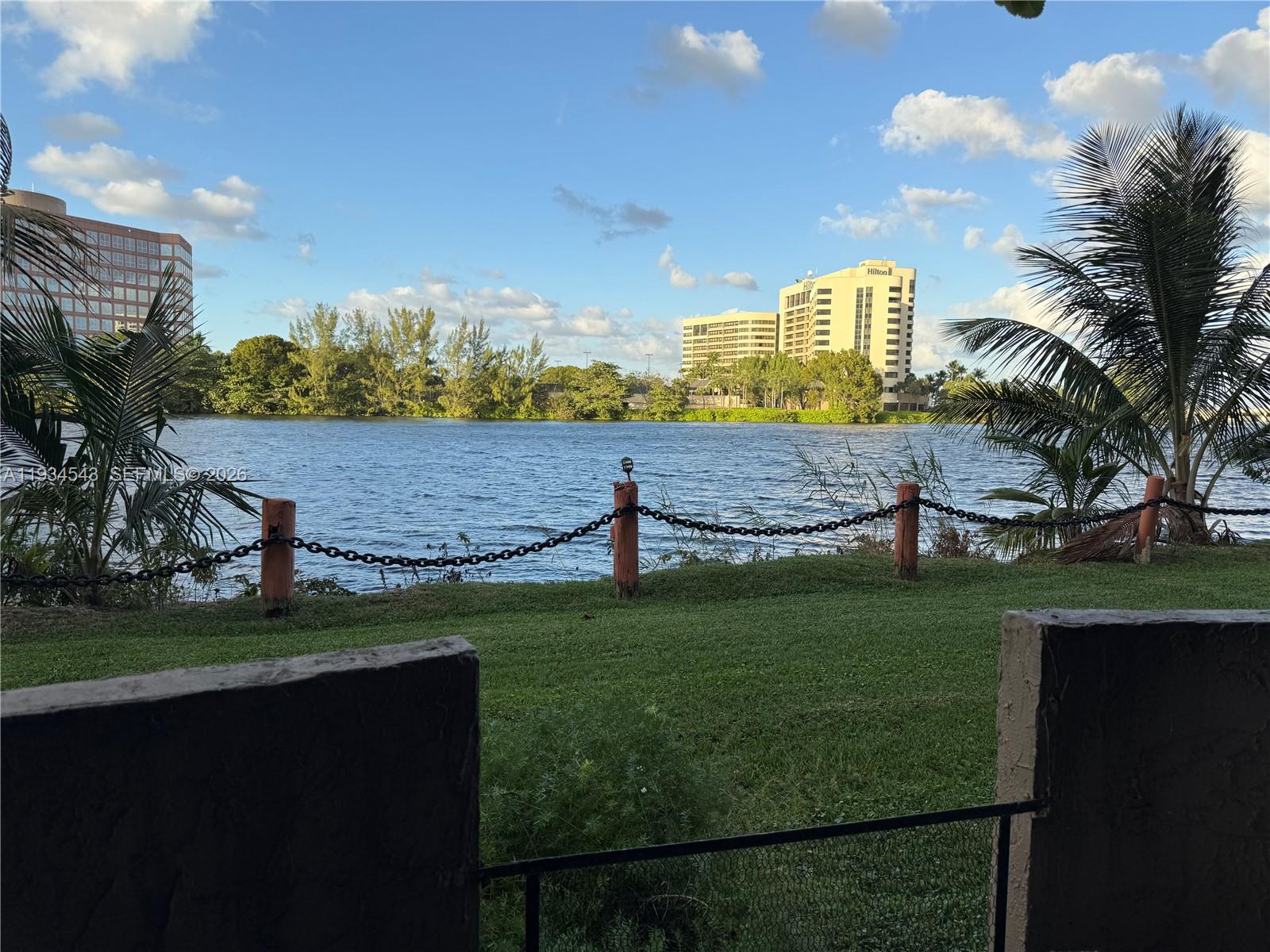 Price Reduction, Beautiful lakefront first-floor condo in a desirable 5-story building, offering 2 bedrooms and 2 full bathrooms. Enjoy tranquil water views with convenient ground-level access—no stairs or elevators required. Bright open living and dining areas with serene lakefront surroundings. Ideally located near Miami International Airport and major expressways, providing easy access to shopping, dining, and downtown Miami.