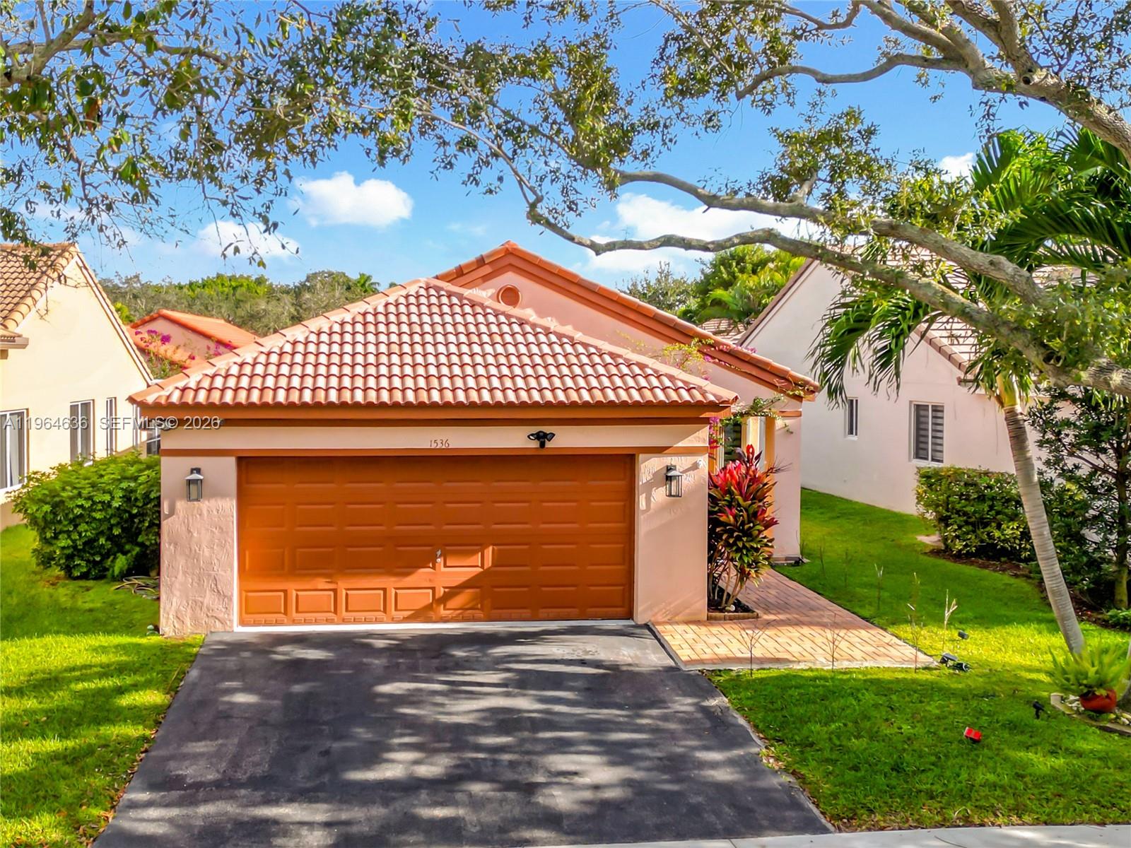 Charming 1-Story Home in Sought-After San Sebastián – Weston, FL
Welcome to this beautifully maintained 3-bedroom, 2-bath home with a 2-car garage. This inviting one-story residence features elegant wood floors throughout the living areas, creating a warm and stylish atmosphere perfect for everyday living and entertaining.
The kitchen shines with sleek stainless steel appliances and ample cabinetry, offering both functionality and modern appeal. The open, airy layout flows effortlessly into the dining and living spaces, making it ideal for family gatherings or hosting guests.
Enjoy comfortable bedrooms, a spacious primary suite with a private bath, and a convenient 2-car garage for storage and parking. Includes accordion shutters throughout the house with impact-resistant windows for added protection and comfort. Located in a quiet, well-kept neighborhood close to top-rated schools, parks, shopping, and dining, this home delivers the best of Weston living. Low HOA fees.
Don’t miss this opportunity to own a move-in-ready home in one of Weston’s most desirable communities! Schedule your private showing today.