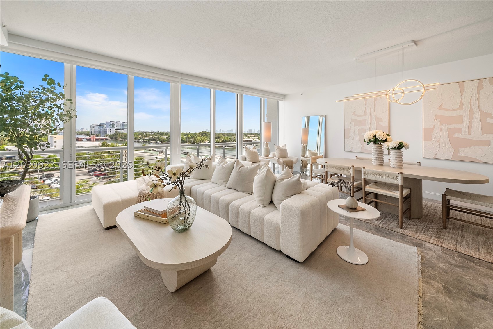 Penthouse Perfection! Recently renovated corner penthouse with private rooftop terrace in the boutique Kobi Karp-designed Regatta at Indian Creek. This 3BD/2.5BA + library residence features 10' ceilings, floor-to-ceiling glass, porcelain flooring, marble baths with elegant nautical finishes, Miele appliances, & a wraparound balcony. Coveted southwest exposure fills the home with natural light while showcasing expansive ocean, Intracoastal, bay, & skyline views from every room. Thoughtfully updated throughout with porcelain flooring, lighting, outlets, switches, baseboards, paint, washer/dryer, & refrigerator (2021), plus a tankless water heater (2022) & new A/C blower & condensing unit (2023).

The crown jewel is the private 336 SF rooftop terrace complete with a Jacuzzi, outdoor shower, & panoramic water & city views—an exceptionally rare feature in Miami Beach. Additional highlights include two assigned garage parking spaces, generous living spaces, abundant natural light, & a thoughtful layout designed for both everyday living & entertaining.

Ideally located just steps from the beach, boardwalk, Publix, parks, cafés, & restaurants. Adjacent to the Ronald W. Shane Watersports Center, residents enjoy easy access to rowing, kayaking, paddle sports, & fitness programs along the protected waters of Indian Creek. Regatta is a newer waterfront building offering concierge, pool, Jacuzzi, sauna, & fitness center amenities, with no current special assessments.