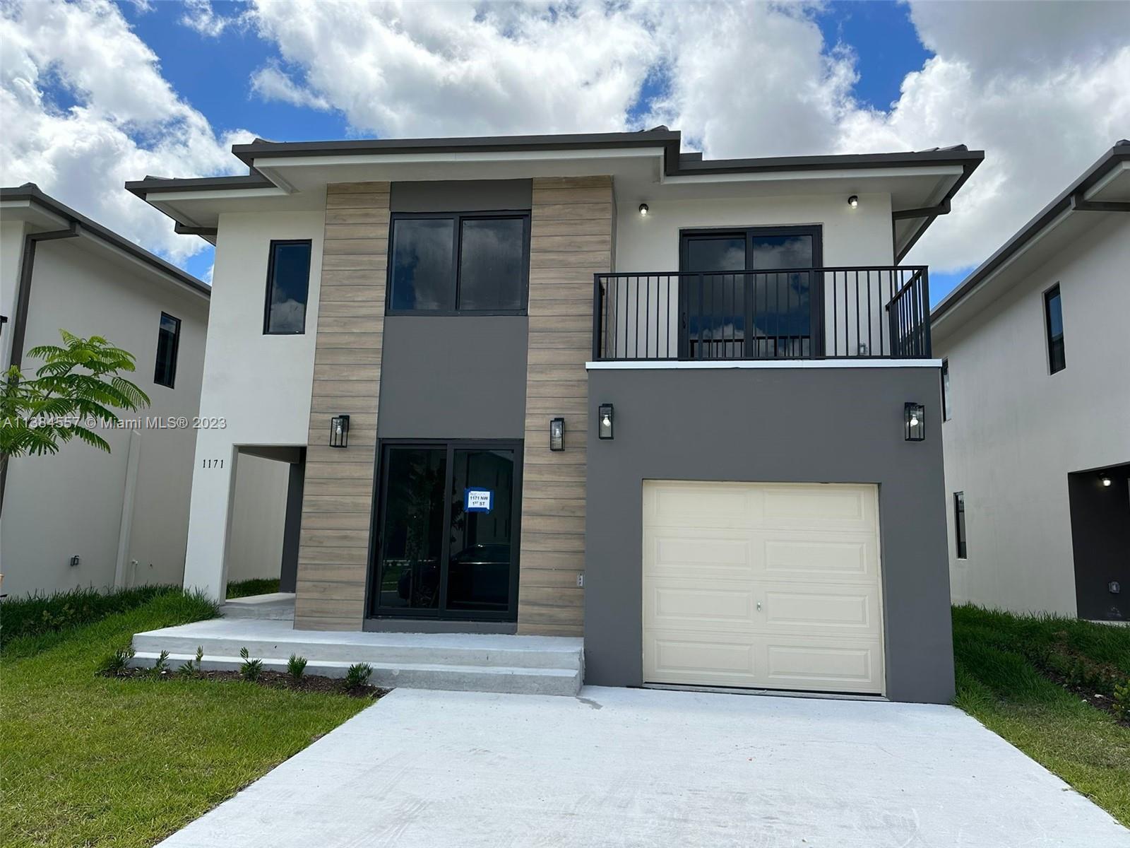 BEAUTIFUL NEW CONSTRUCTION, 2 story home, 5 beds 4.5 baths, garage & fenced backyard. Located in a great residential community in Florida City. Beautiful open kitchen with s/s appliance, stone counter top, double sink. Front load full side washer & dryer. Title flooring throughout the house, impact windows. This house offers a full bedroom with closet & bathroom downstairs . Master room with walking closet and double sink in bathroom. Excellent finishes throughout the house. YOU HAVE TO SEE IT!!!!! ONLY 1st MONTH RENTAL AND 1 MONTH SECURITY DEPOSIT!!