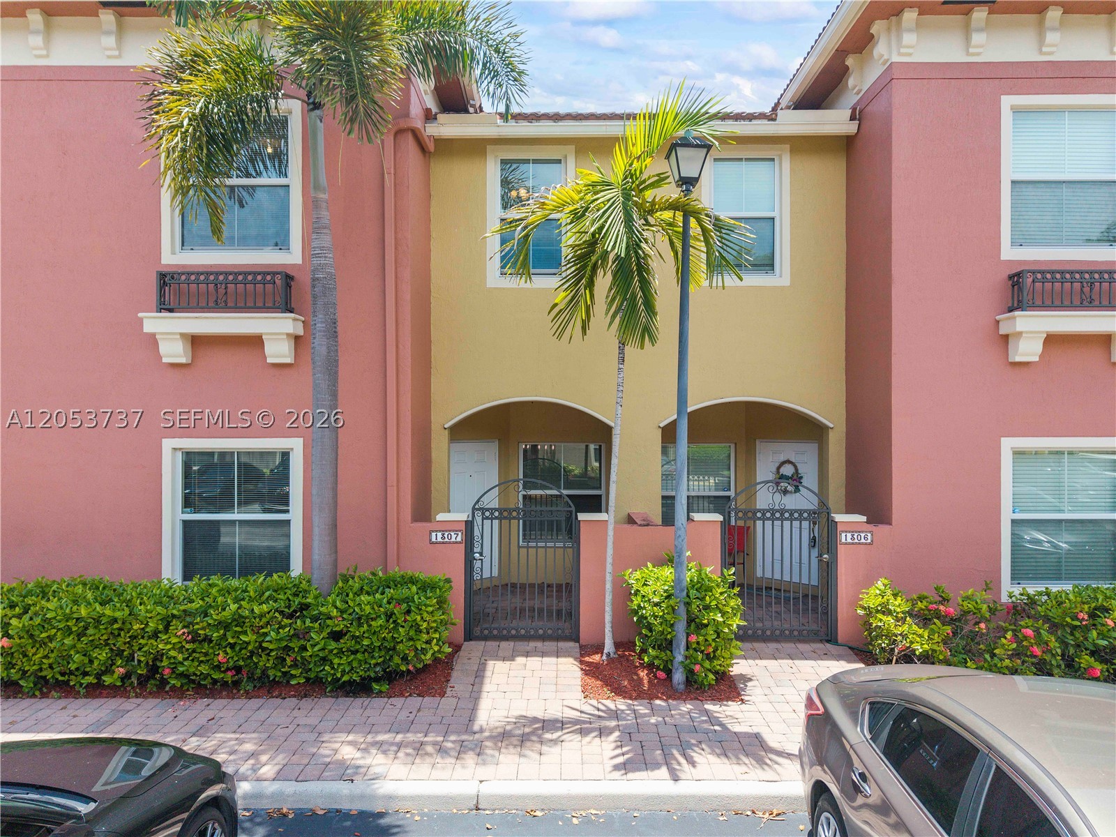 Welcome to Tuscan Villas, a charming gated community offering comfort, style, and convenience. This beautifully maintained 3-bedroom, 2.5-bath townhome features tranquil lake views and spacious living areas, including formal living and dining rooms plus a family room just off the kitchen.

The kitchen is appointed with stainless steel appliances, 42-inch cabinetry, and granite countertops. Upstairs, the spacious primary suite offers walk-in closets, dual sinks, and a large walk-in shower. Two additional bedrooms share a full bath, and the upstairs laundry room with washer and dryer adds everyday convenience.

Additional features include a newer A/C, impact windows and doors, 9-foot ceilings, and abundant natural light throughout. Ideally located with easy access to Fort Lauderdale, major highways, shopping, dining, and entertainment, this exceptional townhome is move-in ready and sure to impress.