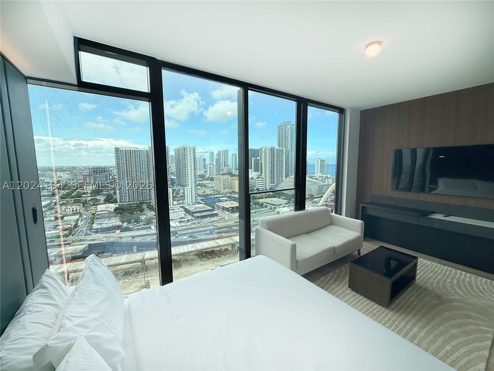 Private beach access for owners. Fully furnished, turnkey corner unit. Eleven Residences ia a 65-story tower located inMiami’s centrally-located Park West District. Short term (daily) leases. Views of the Miami skyline, Biscayne Bayand Atlantic Ocean. Modern and high design residential lobby space. Common areas featuring museum-qualitycurated fine art and installations. Casino-Style Sports Lounge featuring expansive LED video wall with stadiumstyle seating. Chopra Spa & Studio mind & body experiences featuring state-of-the-art fitness center, meditation,yoga, and customized treatment service. Club E11EVEN® Bar & Lounge. E11EVEN® Day Club and pool sits above11 stories, this is ultra-modern multi-level venue with cabanas oversees the stunning Miami skyline. Easy to Show!