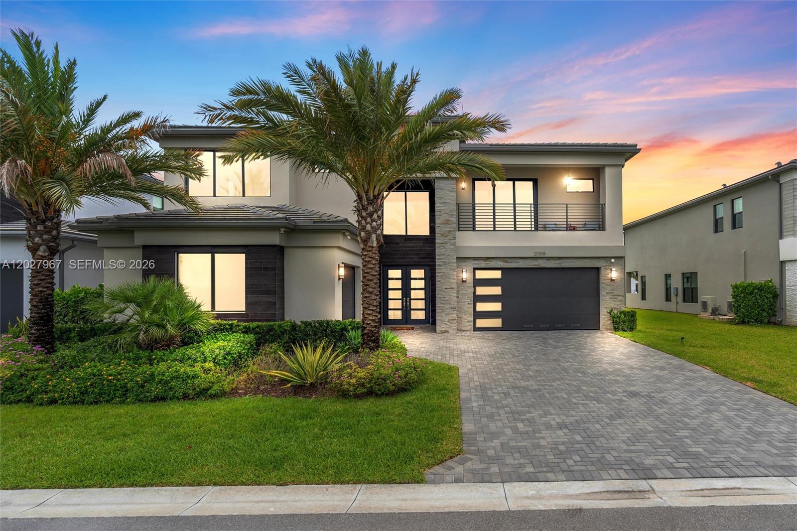 Fully renovated Sumatra Grand model in the highly desirable Lotus Palm community, ideally situated on a quiet dead-end street. This spacious lakefront residence offers modern finishes throughout, an open and inviting floor plan, and beautiful water views. The home features a private pool, covered outdoor living area, full summer kitchen, gazebo, and a movie theater, creating the perfect setting for entertaining or relaxing at home.

Located in an A-rated school district and close to restaurants, shopping, parks, and major roadways, this property combines luxury living with everyday convenience. Move-in ready and thoughtfully updated, this lakefront pool home is a must-see.