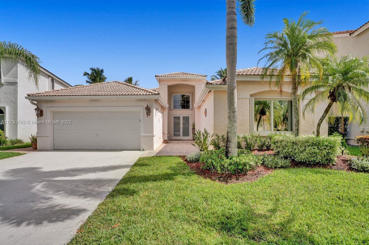 Spectacular water view from almost every room in this gorgeous 3 bedroom, 2.5 bath home with split bedroom floorpan. Meticulously maintained with lots of upgrades; including Hurricane Impact Windows throughout, Hurricane Shutters on all windows, electric shades in primary bedroom, pull out cabinets in the kitchen, newer AC unit with brand new motor, huge walk in closets, beautiful French Doors to enjoy the stunning view, and so much more. Relax and entertain in your spacious, completely private, screened patio overlooking a view that you must see! This home is located in the fabulous community of The Falls Weston, which features a beautiful pool, basketball court, playground, clubhouse, and more. Perfectly located; close to major highways and walking distance to A-Rated Elementary​​‌​​​​‌​‌​​​‌‌​​​‌‌‌​​‌​​‌‌​​​​ School.