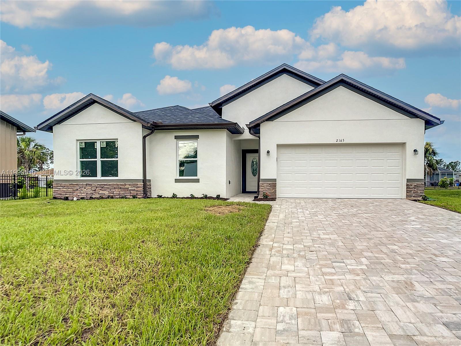 Beautiful nearly new home with only two years of construction, offering modern design and comfortable living. This property features 4 spacious bedrooms and a bright open-concept floor plan that seamlessly connects the living, dining, and kitchen areas—perfect for everyday living and entertaining. The modern kitchen features stainless steel appliances, a kitchen island, and elegant stone countertops, creating a stylish and functional space. Vinyl flooring throughout the home provides durability, easy maintenance, and a clean contemporary look. Designed with comfort and functionality in mind, this home offers spacious and inviting living areas ideal for families or anyone looking for a modern Florida lifestyle. Conveniently located in a growing area of Port Charlotte that blends residential comfort with nearby commercial conveniences, with easy access to shopping centers, restaurants, parks, golf courses, marinas, and the beautiful Gulf Coast beaches. Move-in ready and modern, this home is a fantastic opportunity to enjoy the Florida lifestyle. (Photos are from a model home.) THE TENANTS ARE CURRENTLY ON A MONTH-TO-MONTH LEASE.