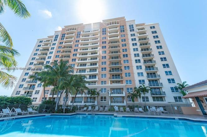 Experience sophisticated urban living with convenience you value in this spacious 1,200 sq. ft. 2-bedroom, 2-bath split floor plan condo on the 9th floor at 3232 Coral Way in the heart of Coral Gables. Enjoy breakfast on your private balcony with pool and Downtown Miami skyline views, or unwind at sunset from the second balcony. The bright open layout features a modern kitchen with granite counters, stainless steel appliances, and breakfast counter. Hurricane-impact windows and doors deliver abundant natural light. The split master offers a walk-in closet and marble baths; one includes an ADA-accessible shower. New full-size washer and dryer included.
This full-service high-rise delivers resort-style amenities: pool, fully equipped gym, sauna, party room, conference center, Amazon lockers, 24-hour security, on-site management, and one assigned covered parking space. Maintenance covers cable with premium channels, WiFi, and water. Pets allowed with restrictions. Easy to show. Positioned for effortless access—directly connected to Sergio’s Cuban restaurant and moments from Coral Gables dining and shopping, Coconut Grove, Brickell, Downtown Miami, the beach and airport via quck Uber. Skyline views and vibrant nearby energy meet full-service ease in one of Miami’s most desirable locations.