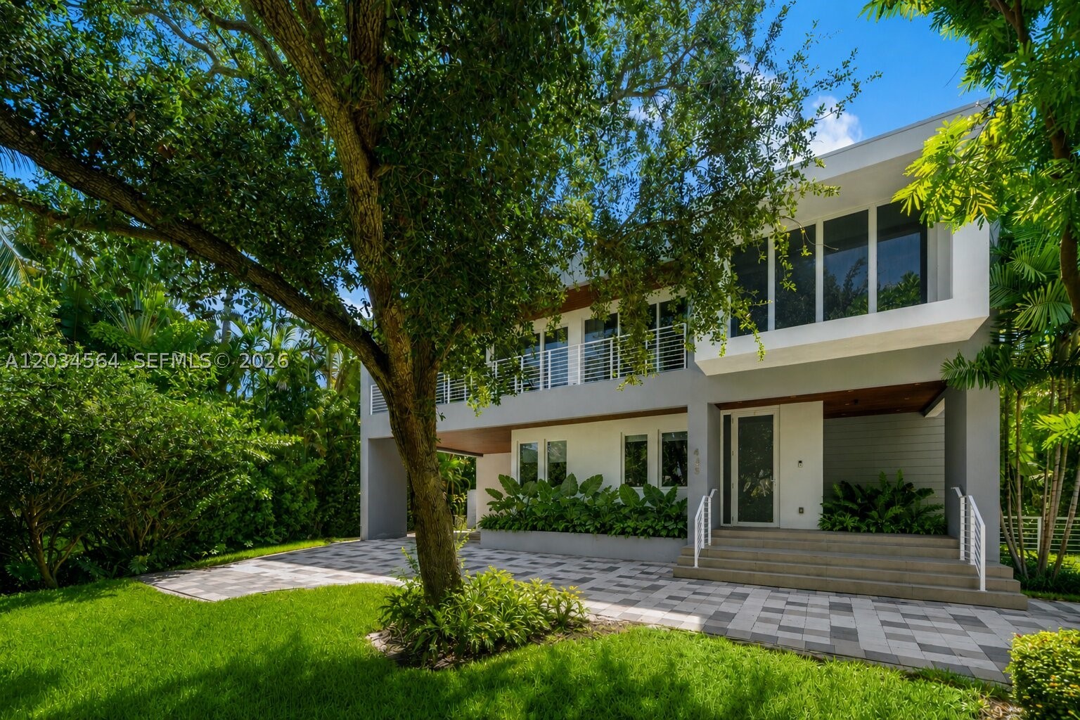 Discover this striking contemporary residence, perfectly positioned on an oversized 9,258 SF lot on Harbor Drive, one of Key Biscayne’s most elegant and prestigious streets.
Built in 2020, this architectural masterpiece offers 6 bedrooms plus a private office, 7 full baths, and 2 powder rooms across 4,565 SF of beautifully designed living space. Filled with natural light, the home showcases expansive open living areas, impressive volume throughout, and a sleek custom kitchen featuring bespoke cabinetry and top-of-the-line finishes.
An elevator provides seamless access to all three levels, culminating in a spectacular rooftop terrace with captivating island views and refreshing bay breezes…a unique advantage of being just moments from the water.
Designed for effortless indoor-outdoor living, the exterior features a resort-style saltwater pool and spa, summer kitchen, cabana bath, and generous entertaining areas surrounded by lush tropical landscaping.
Additional highlights include , EV charger, and ample driveway parking. Combining exceptional design, comfort, and functionality, this residence embodies the very best of island living in one of Key Biscayne’s most distinguished locations.
Just minutes from Miami, Key Biscayne is a hidden island paradise where pristine beaches, world-class outdoor recreation, and a relaxed yet sophisticated lifestyle come together in a way that few places can match.